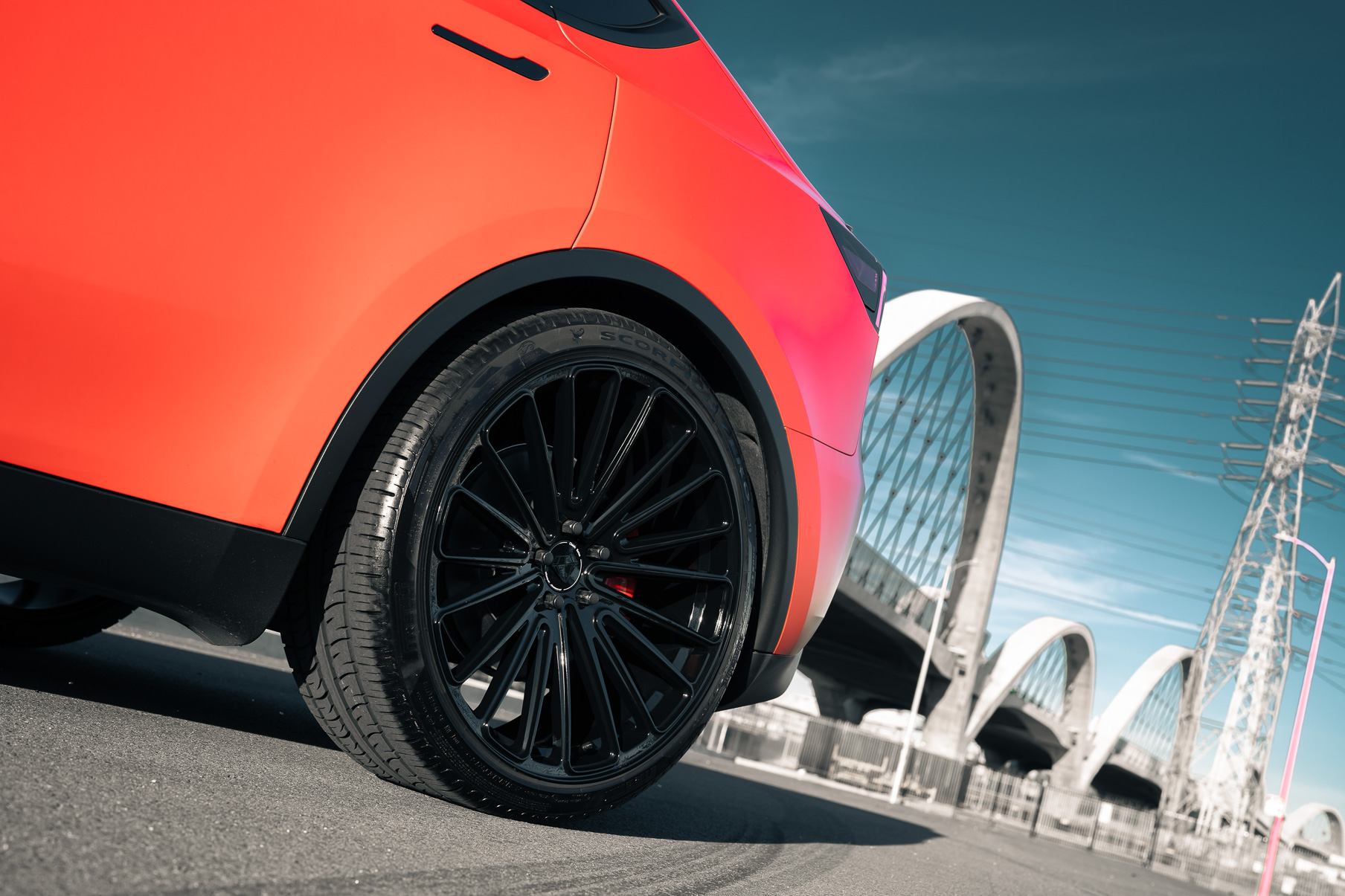 A Matte Red 2022 Tesla Model Y on Blaque Diamond BD-715 Gloss Black Wheels