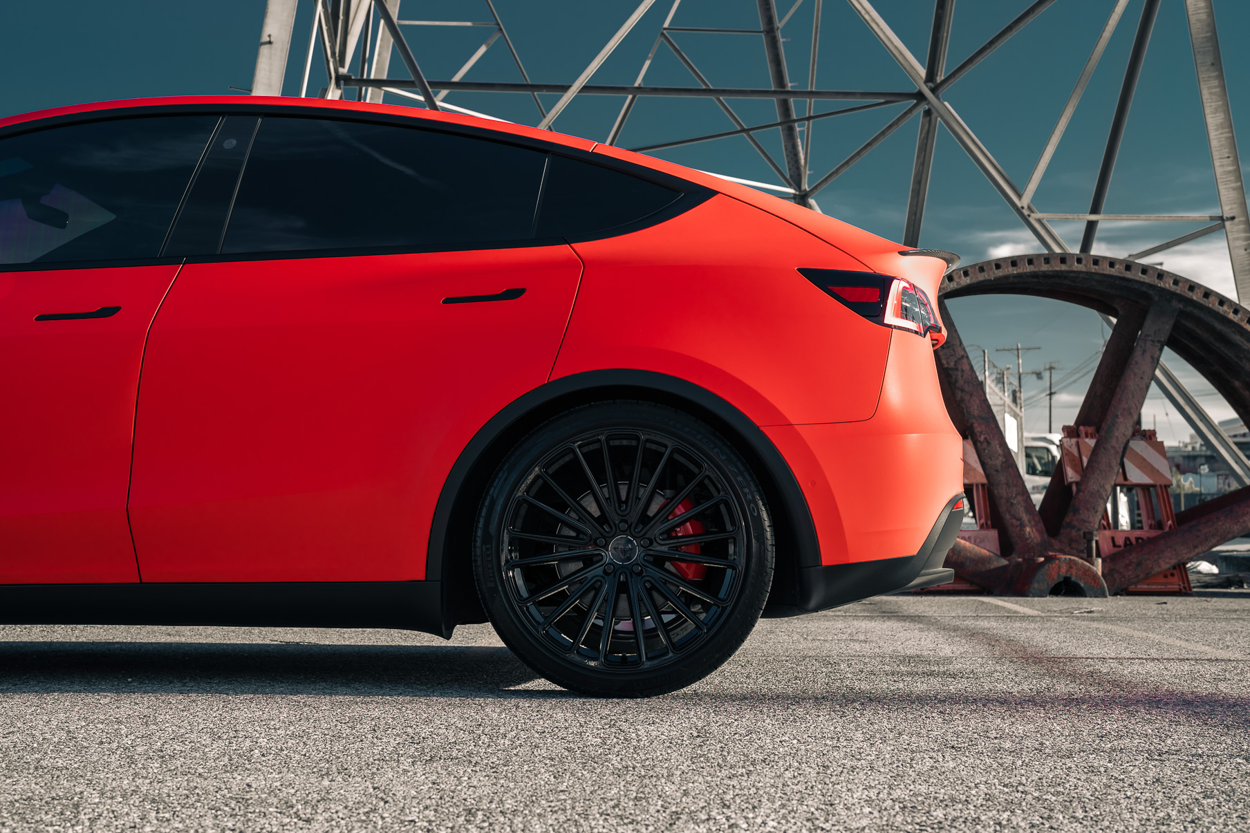 A Matte Red 2022 Tesla Model Y on Blaque Diamond BD-715 Gloss Black Wheels