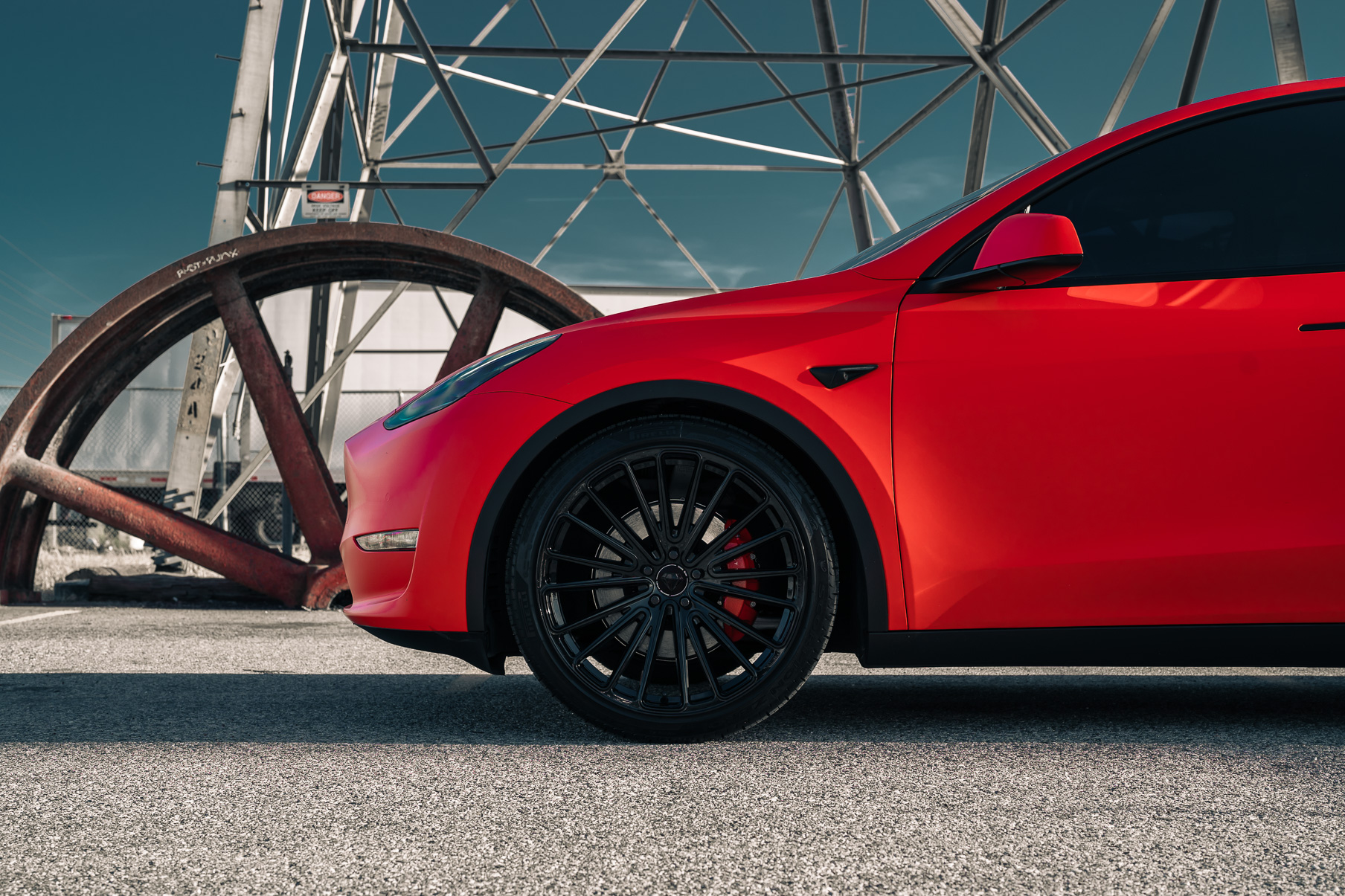 A Matte Red 2022 Tesla Model Y on Blaque Diamond BD-715 Gloss Black Wheels