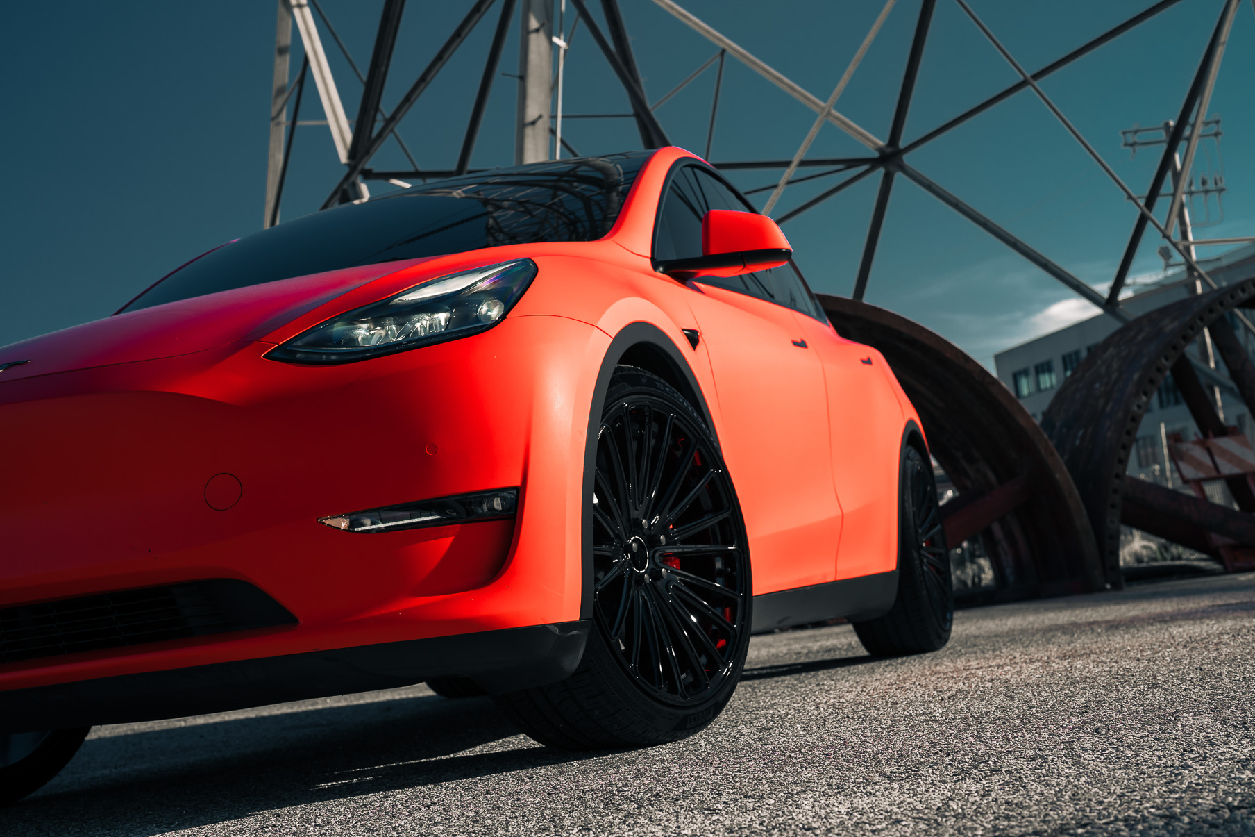A Matte Red 2022 Tesla Model Y on Blaque Diamond BD-715 Gloss Black Wheels