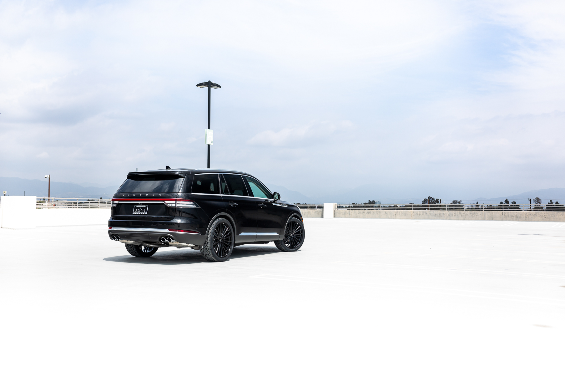 A 2023 Lincoln Aviator on Blaque Diamond BD-715 Gloss Black Wheels