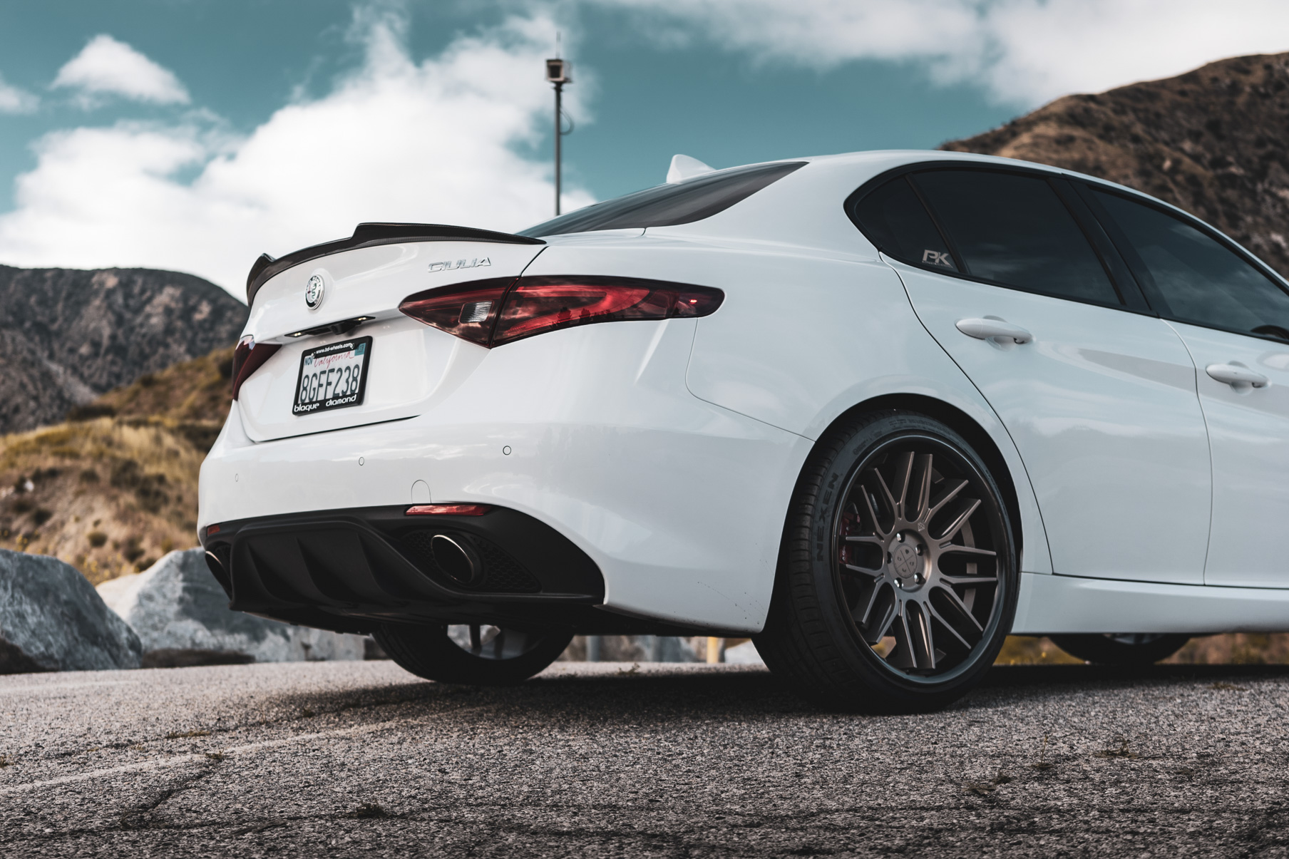 A 2019 Romeo Giulia on Blaque Diamond BD-27 Bronze Wheels