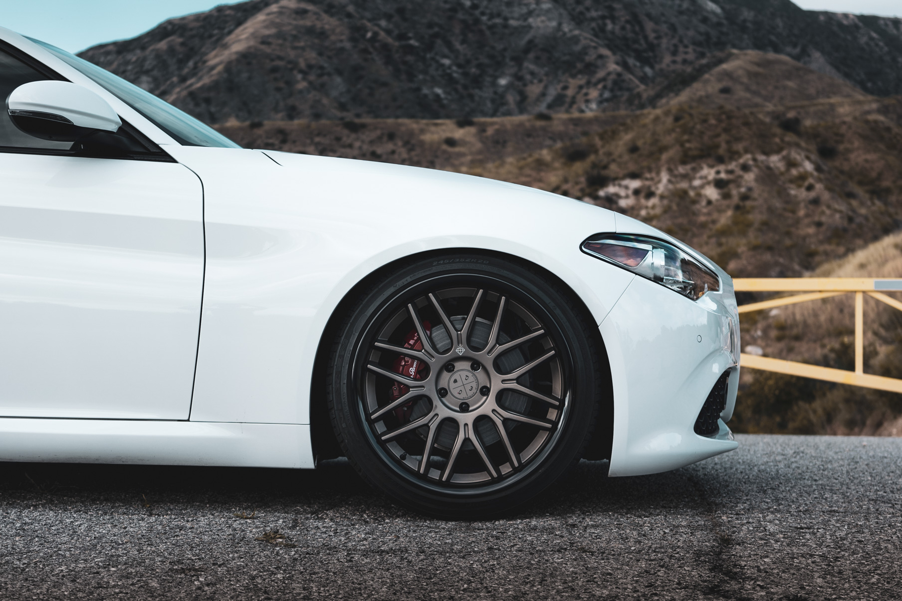 A 2019 Romeo Giulia on Blaque Diamond BD-27 Bronze Wheels