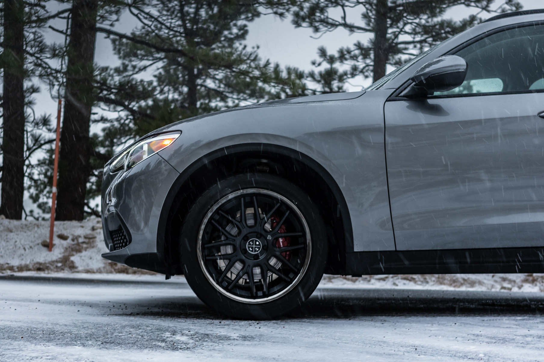 A 2018 Alfa Romeo Stelvio on Blaque Diamond BD-17 Matte Black with Black Chrome Wheels
