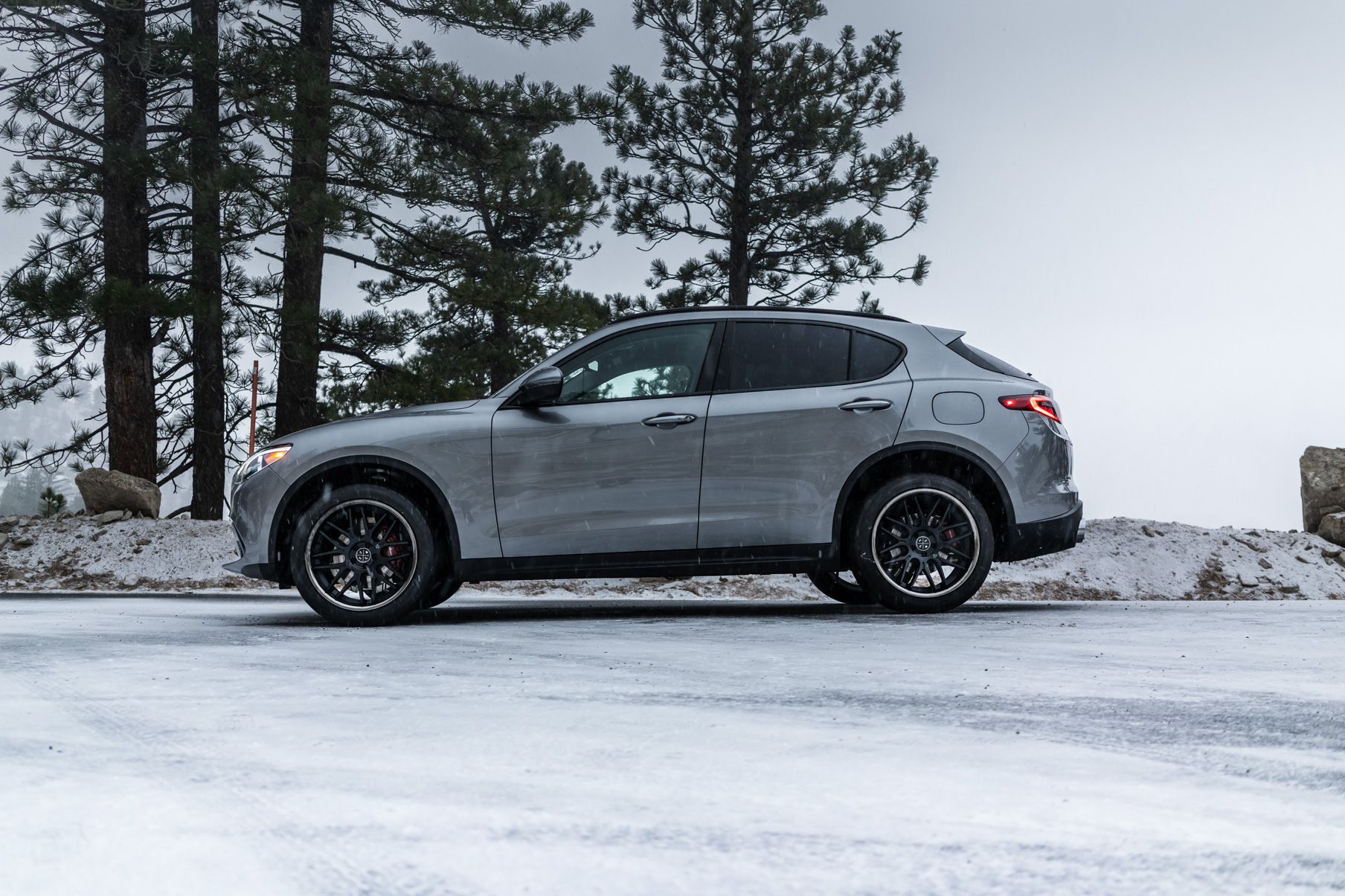 A 2018 Alfa Romeo Stelvio on Blaque Diamond BD-17 Matte Black with Black Chrome Wheels