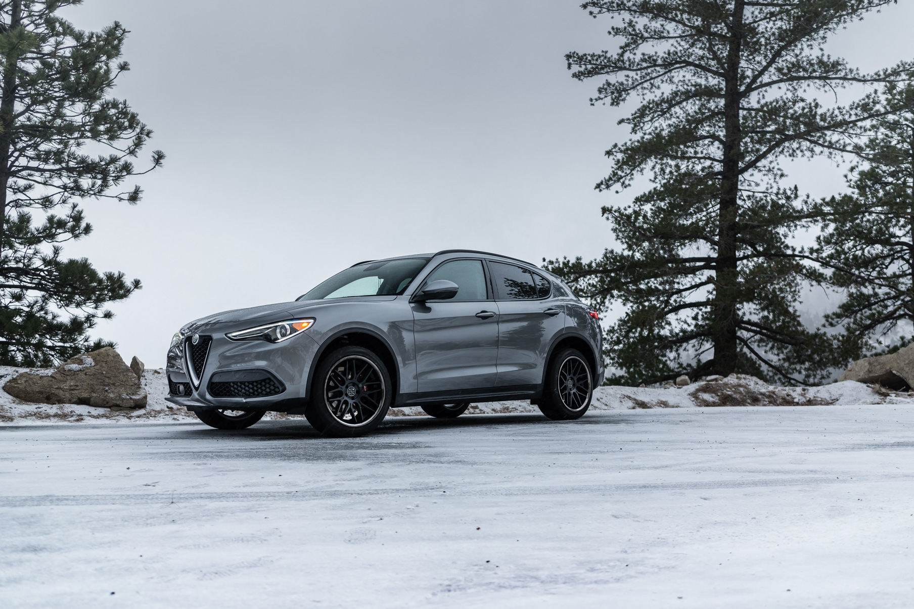 A 2018 Alfa Romeo Stelvio on Blaque Diamond BD-17 Matte Black with Black Chrome Wheels