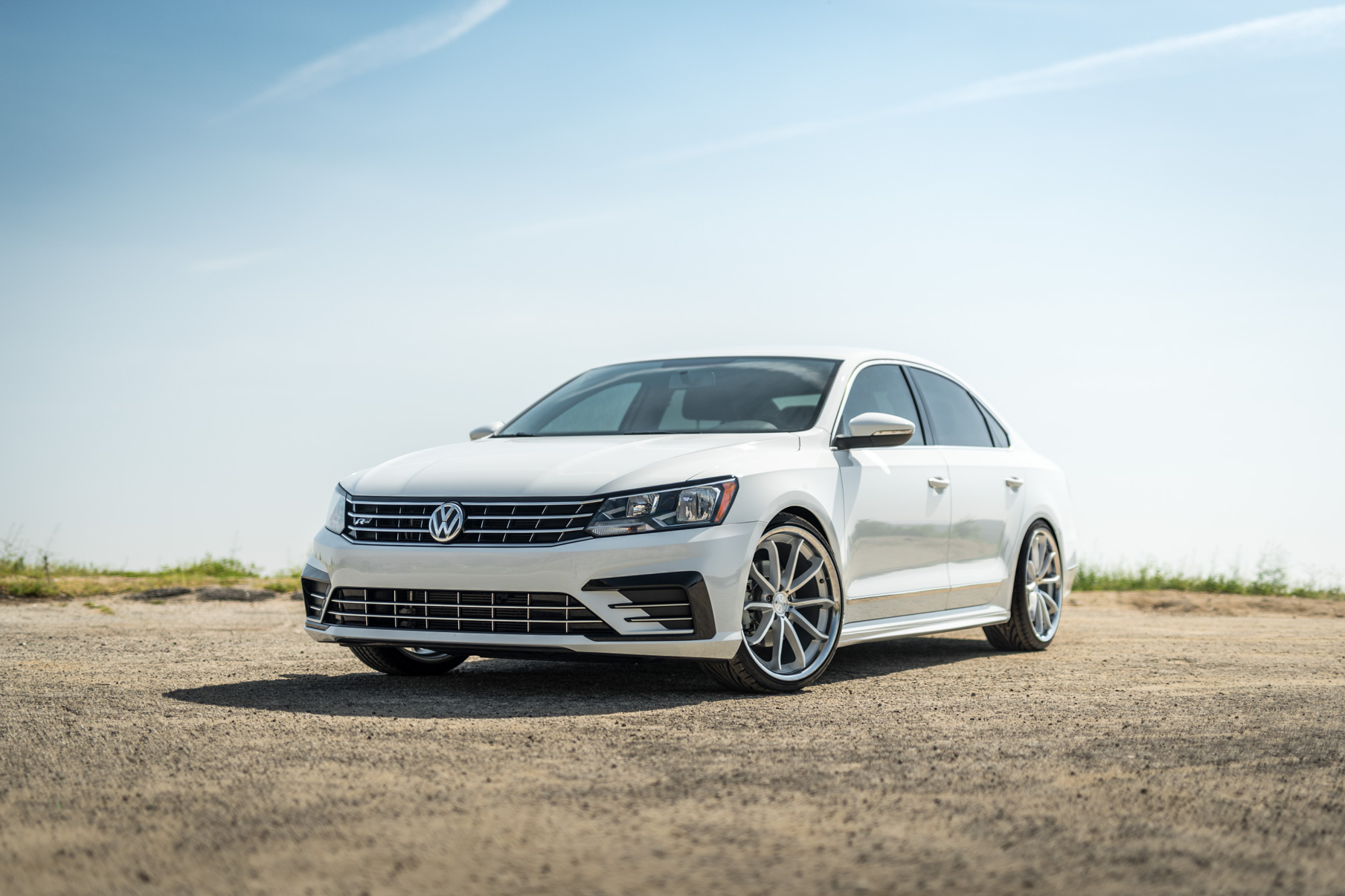 A 2016 VW Passat R Line on Blaque Diamond BD-23 Silver with Chrome Lip Wheels