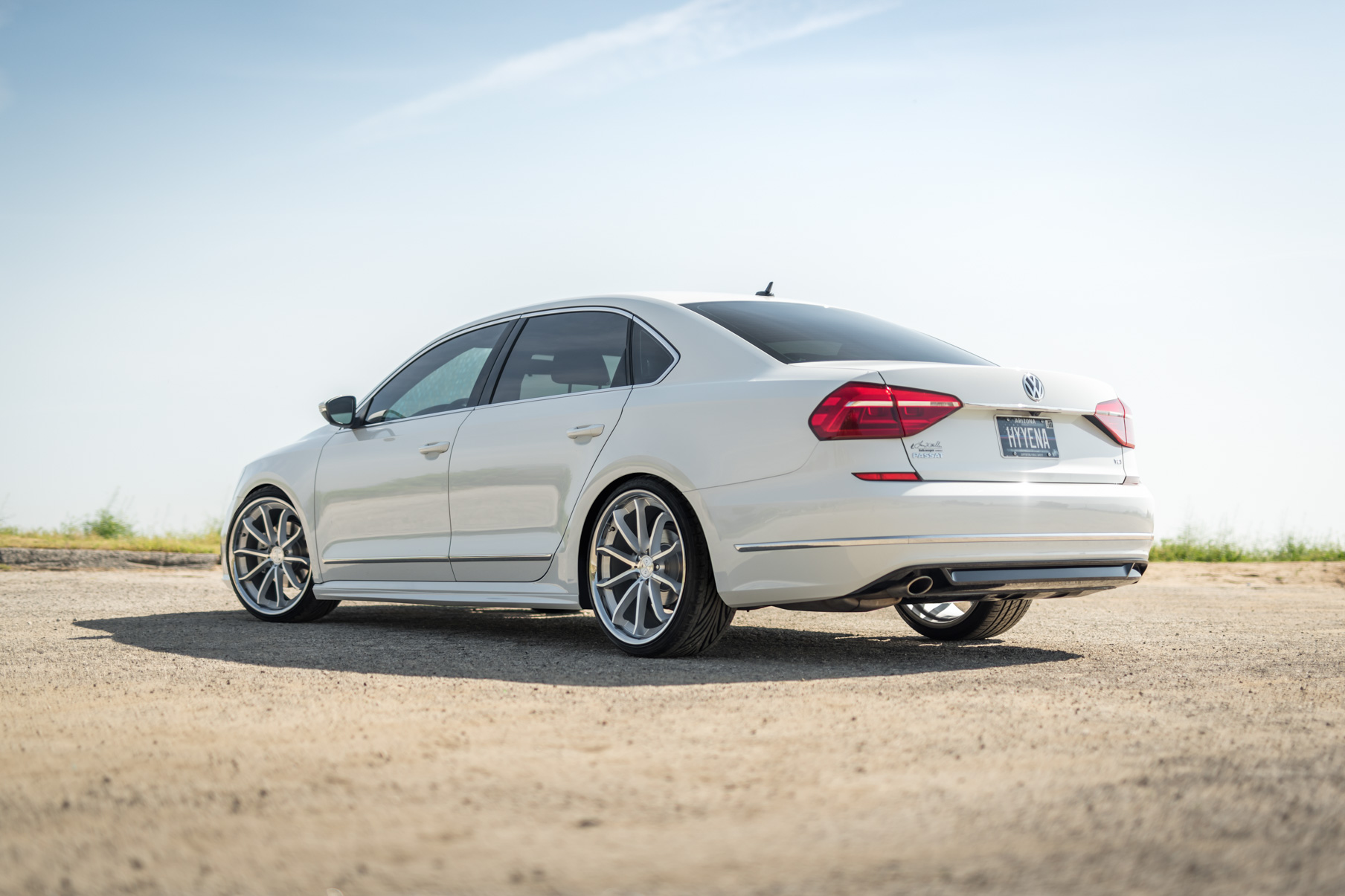 A 2016 VW Passat R Line on Blaque Diamond BD-23 Silver with Chrome Lip Wheels