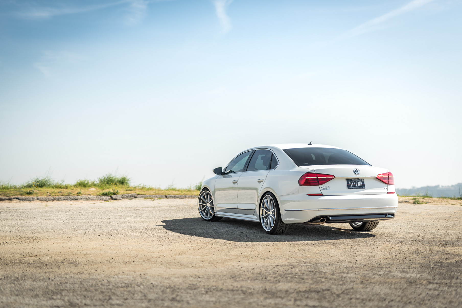 A 2016 VW Passat R Line on Blaque Diamond BD-23 Silver with Chrome Lip Wheels