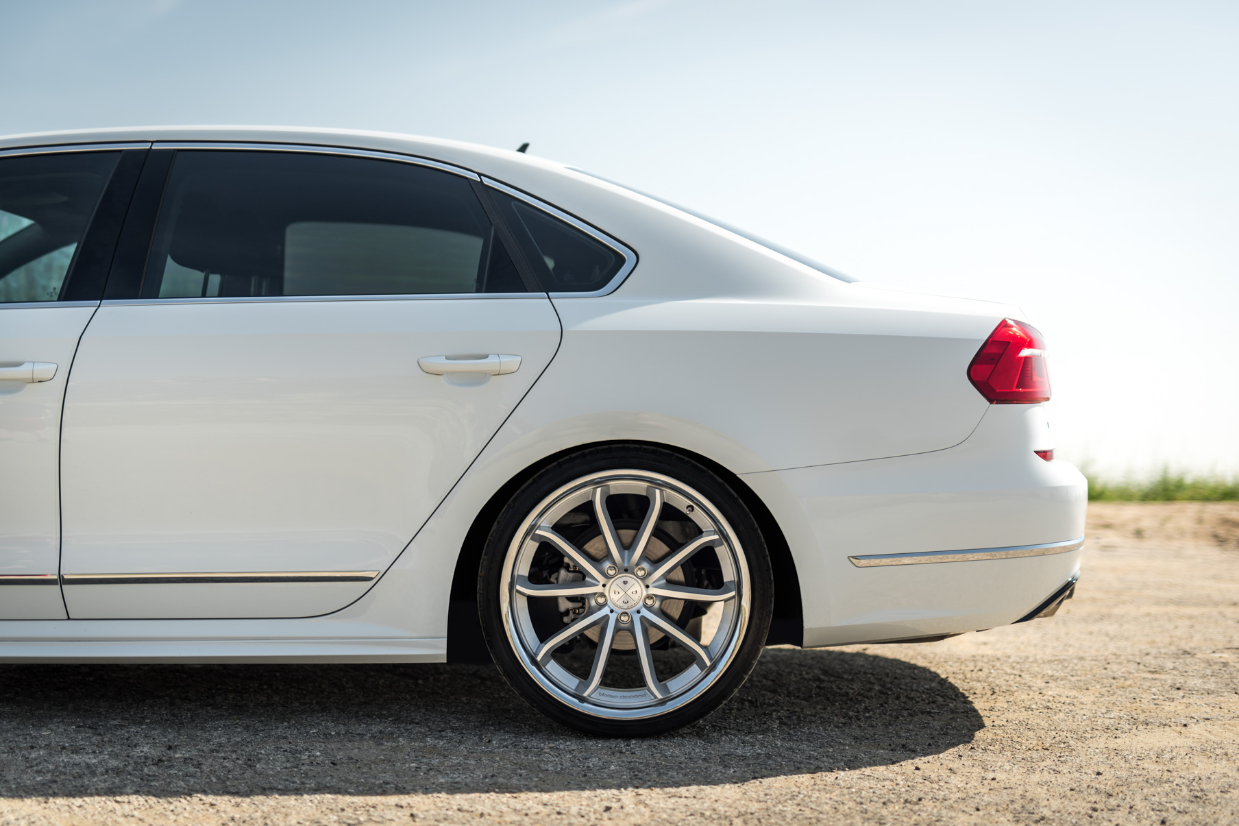 A 2016 VW Passat R Line on Blaque Diamond BD-23 Silver with Chrome Lip Wheels