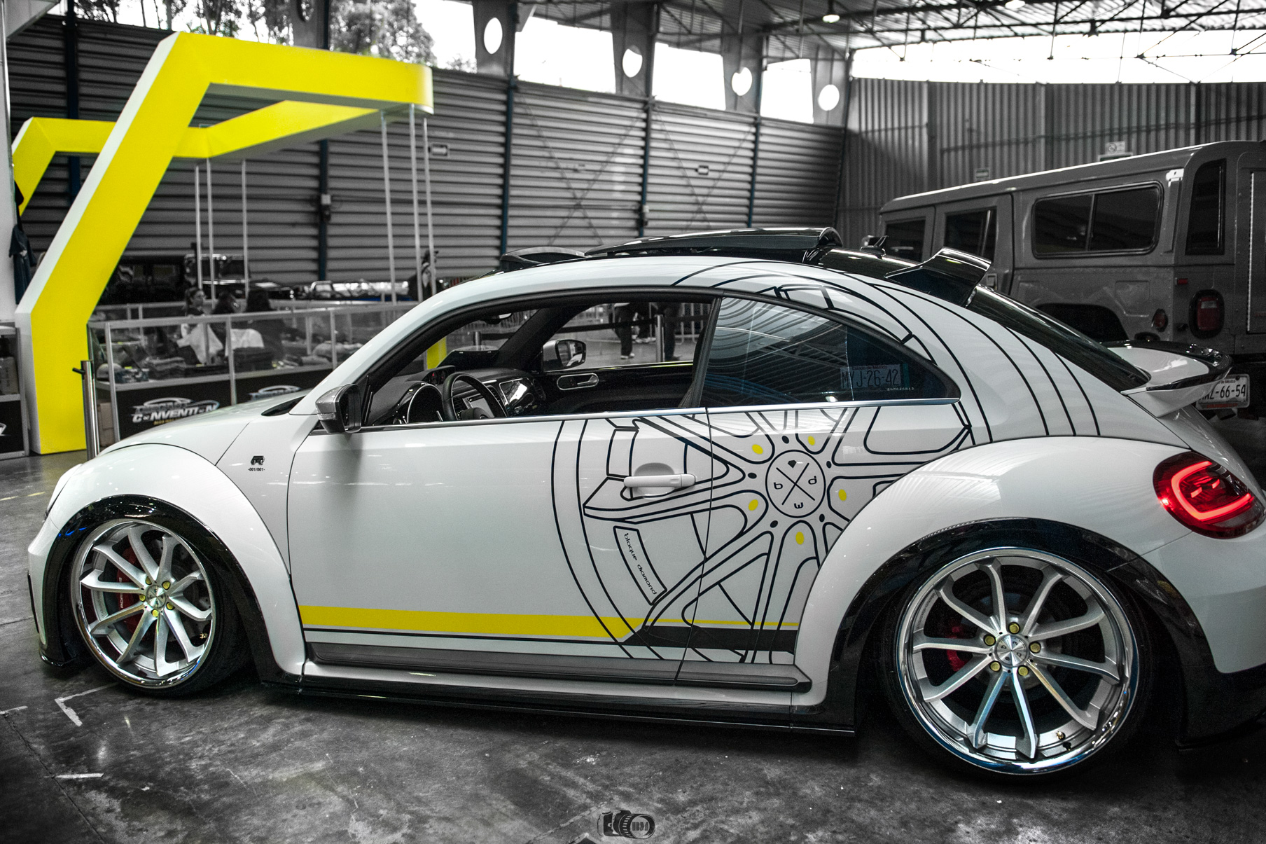 A 2018 VW Beetle on Blaque Diamond BD-23 Gloss Silver Wheels