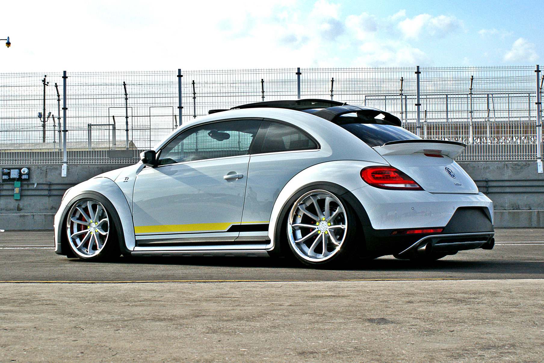A 2018 VW Beetle on Blaque Diamond BD-23 Gloss Silver Wheels