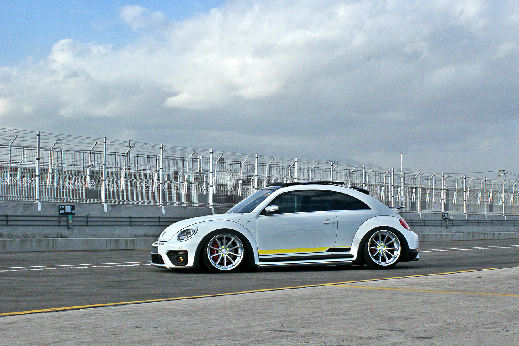A 2018 VW Beetle on Blaque Diamond BD-23 Gloss Silver Wheels