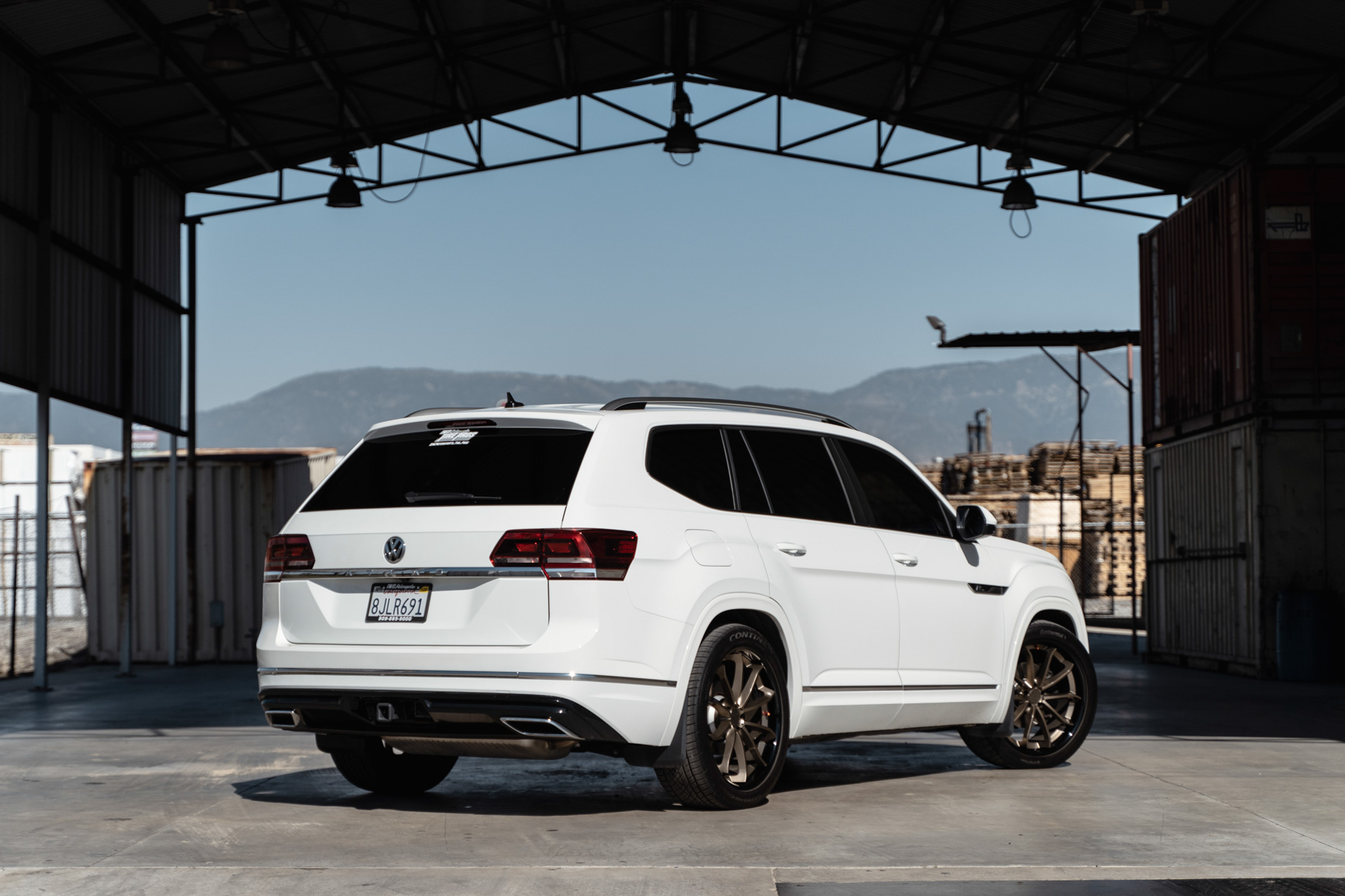 A 2018 Volkswagen Atlas on Blaque Diamond BD-23 22 inch Matte Bronze Wheels