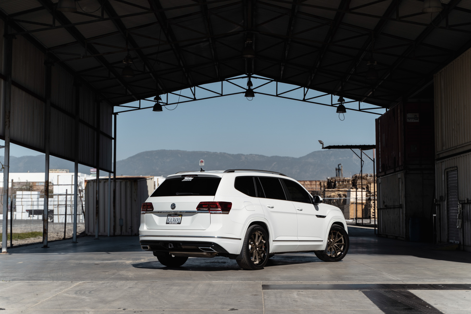 A 2018 Volkswagen Atlas on Blaque Diamond BD-23 22 inch Matte Bronze Wheels