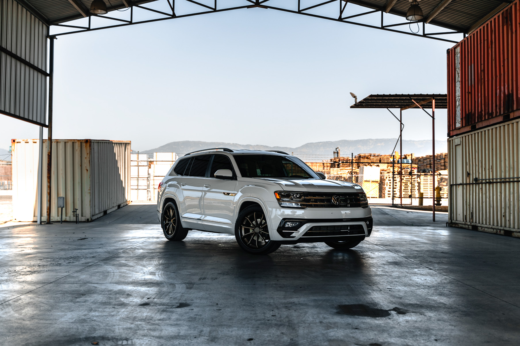 A 2018 Volkswagen Atlas on Blaque Diamond BD-23 22 inch Matte Bronze Wheels