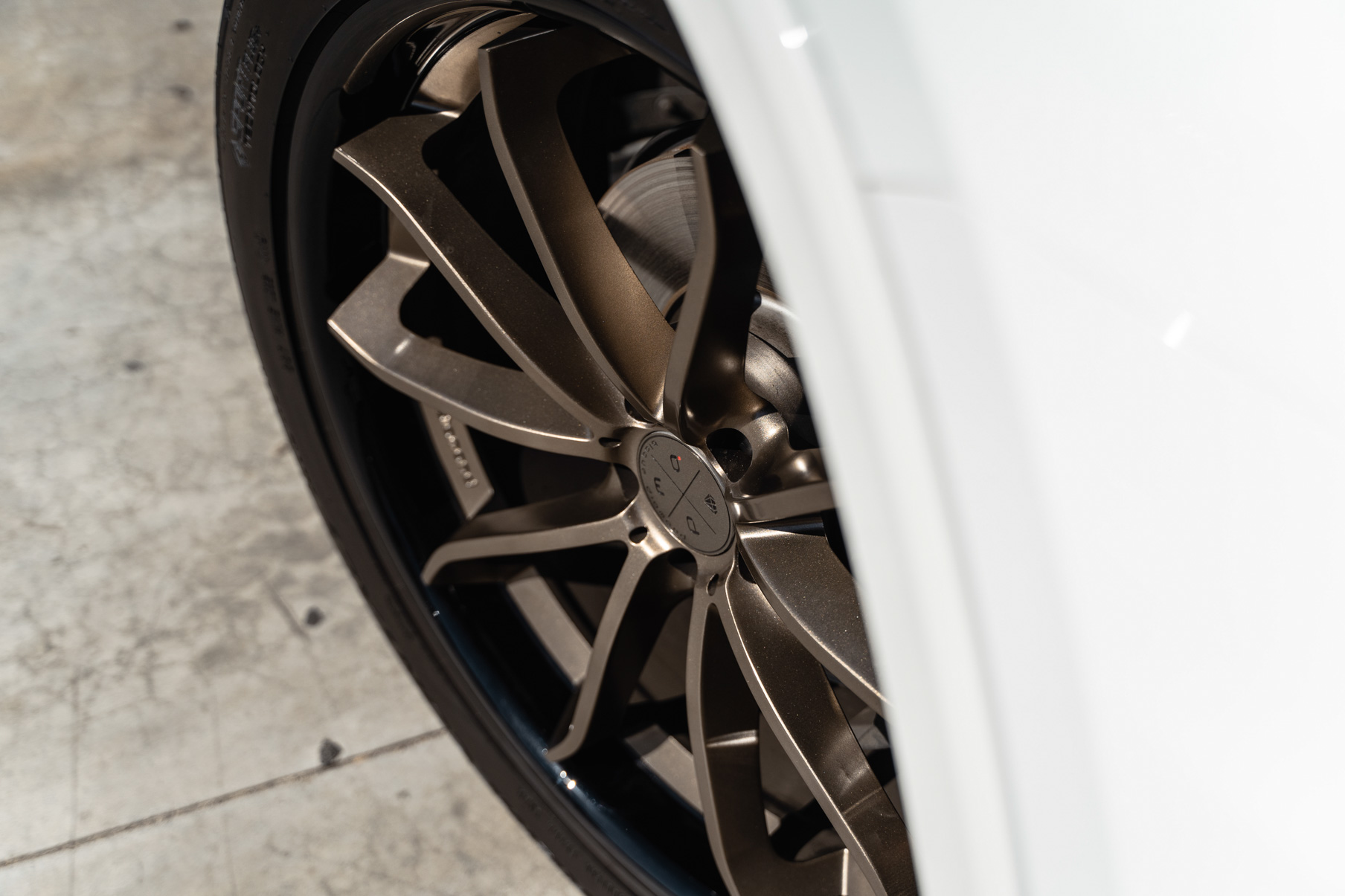 A 2018 Volkswagen Atlas on Blaque Diamond BD-23 22 inch Matte Bronze Wheels