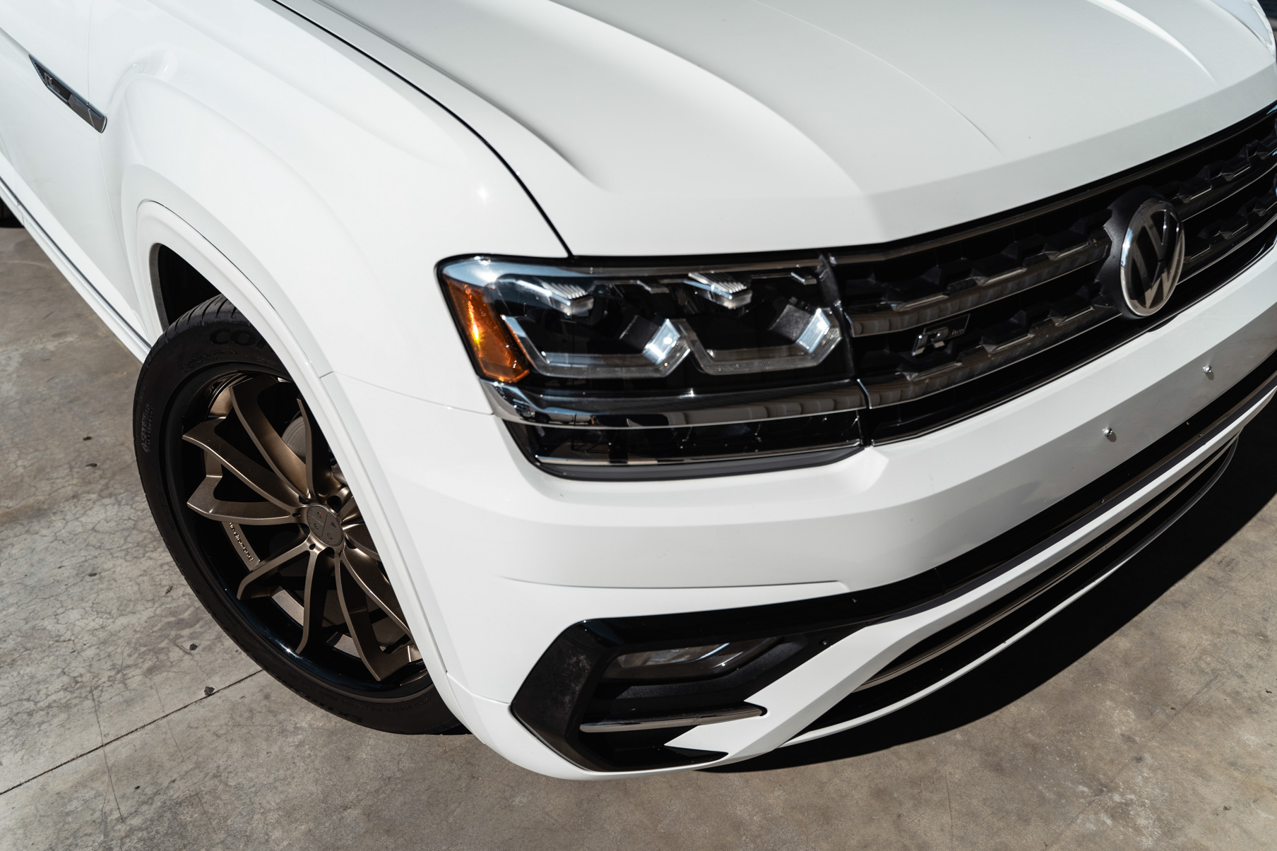 A 2018 Volkswagen Atlas on Blaque Diamond BD-23 22 inch Matte Bronze Wheels