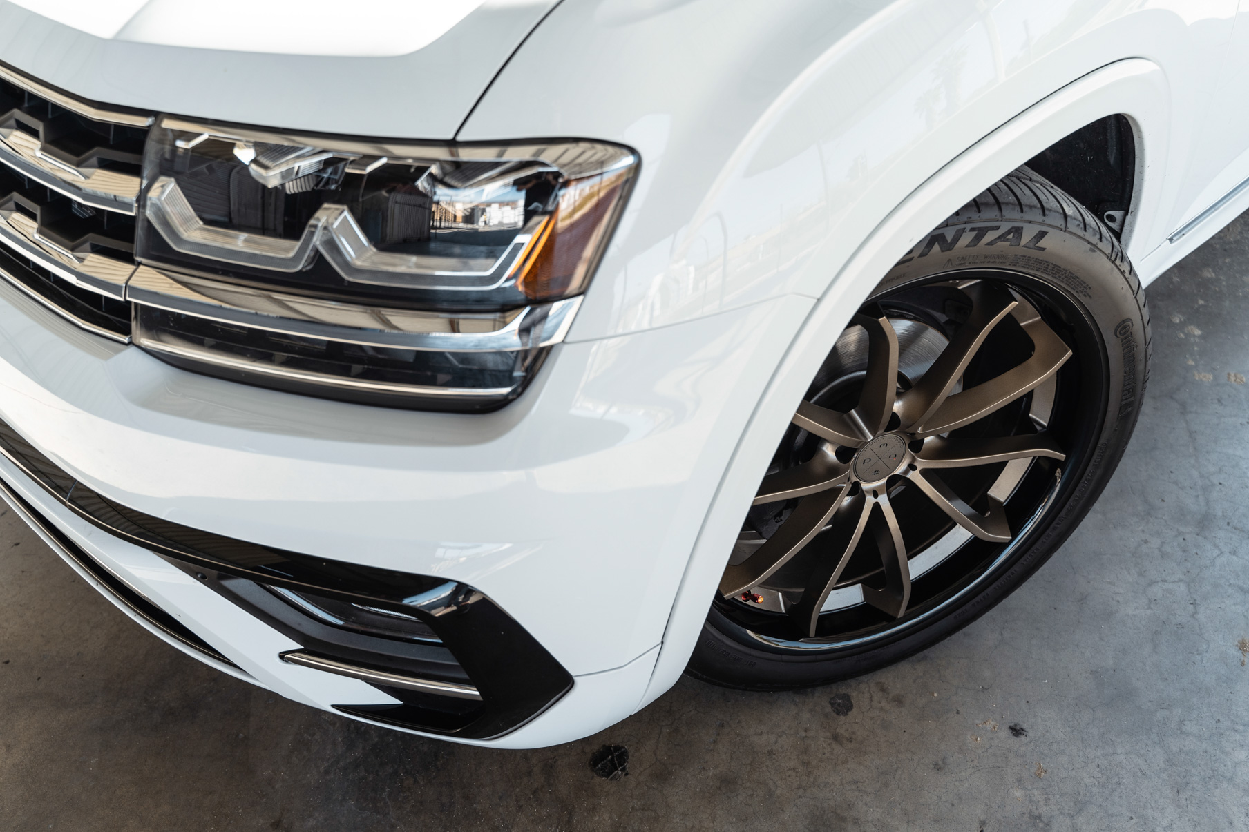 A 2018 Volkswagen Atlas on Blaque Diamond BD-23 22 inch Matte Bronze Wheels