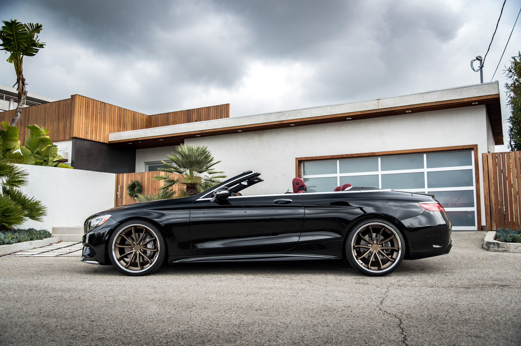 A Black 2016 Mercedes-Benz S550 on Blaque Diamond BD-23 20 inch Bronze Wheels
