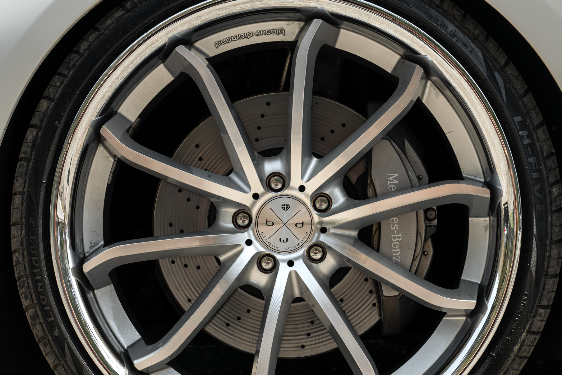 A 2015 Mercedes-Benz S550 on Blaque Diamond BD-F23 Gloss Silver with Chrome Lip Wheels