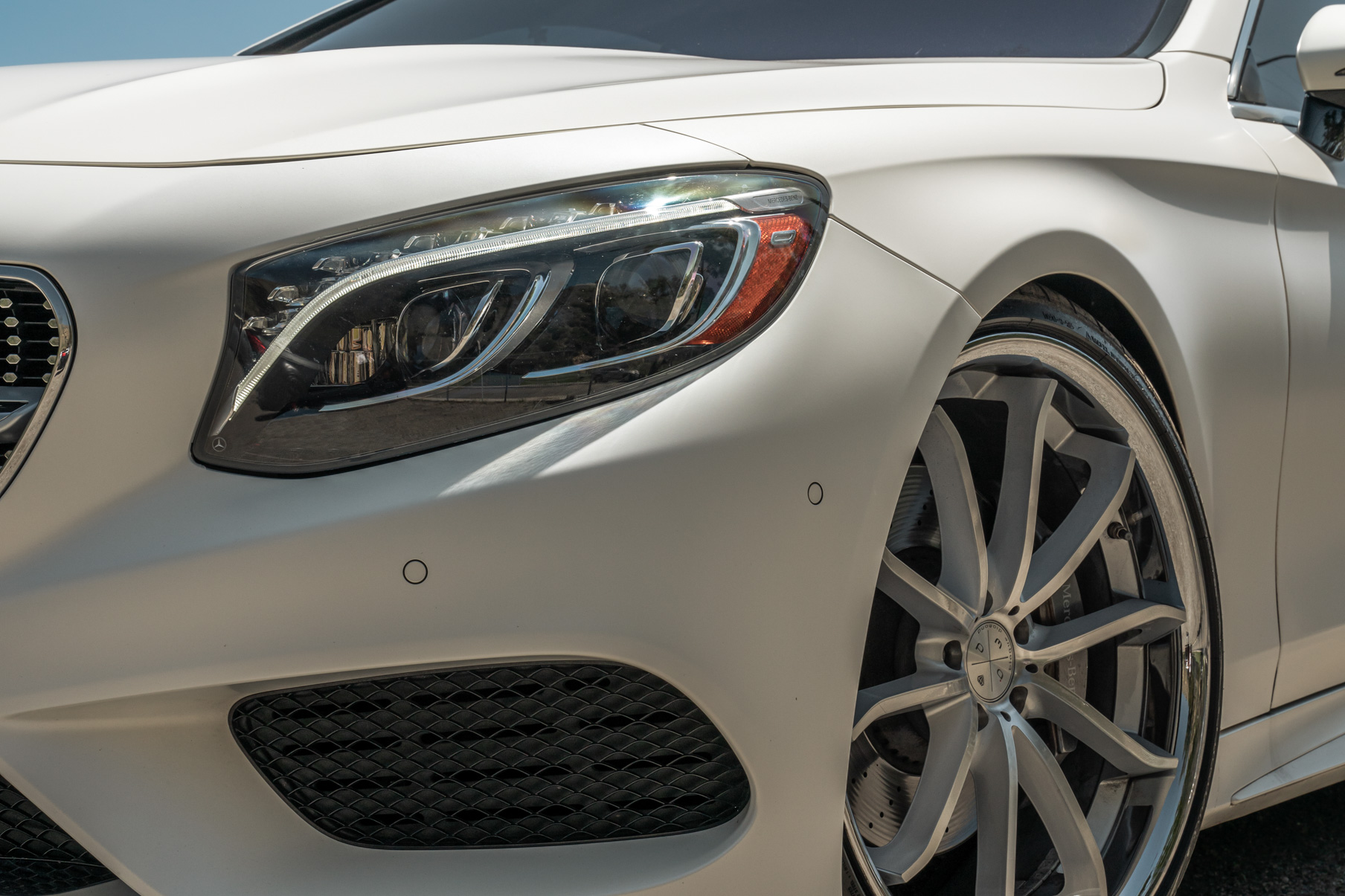A 2015 Mercedes-Benz S550 on Blaque Diamond BD-F23 Gloss Silver with Chrome Lip Wheels