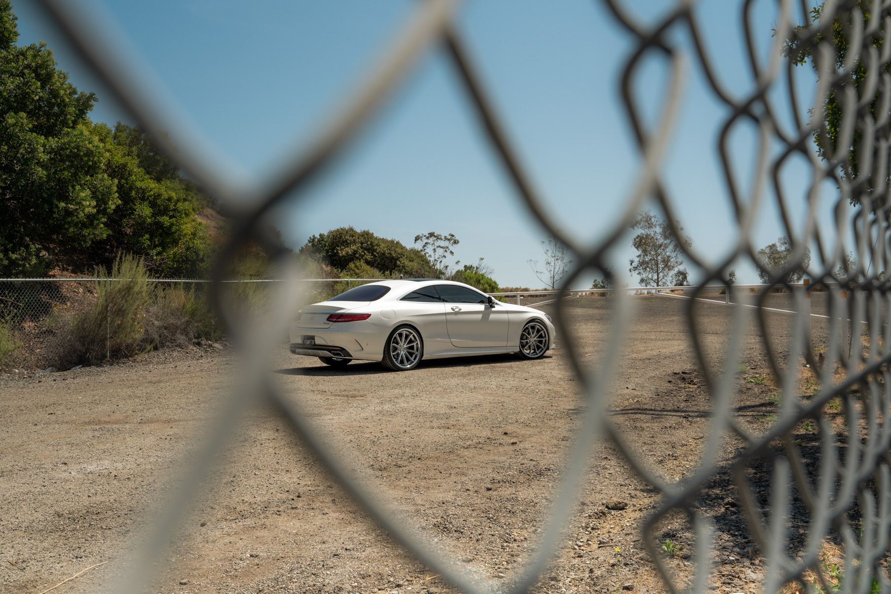 A 2015 Mercedes-Benz S550 on Blaque Diamond BD-F23 Gloss Silver with Chrome Lip Wheels