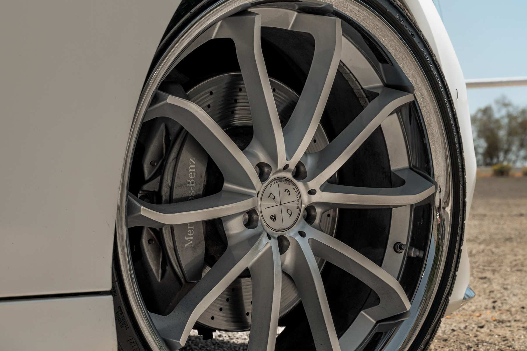 A 2015 Mercedes-Benz S550 on Blaque Diamond BD-F23 Gloss Silver with Chrome Lip Wheels