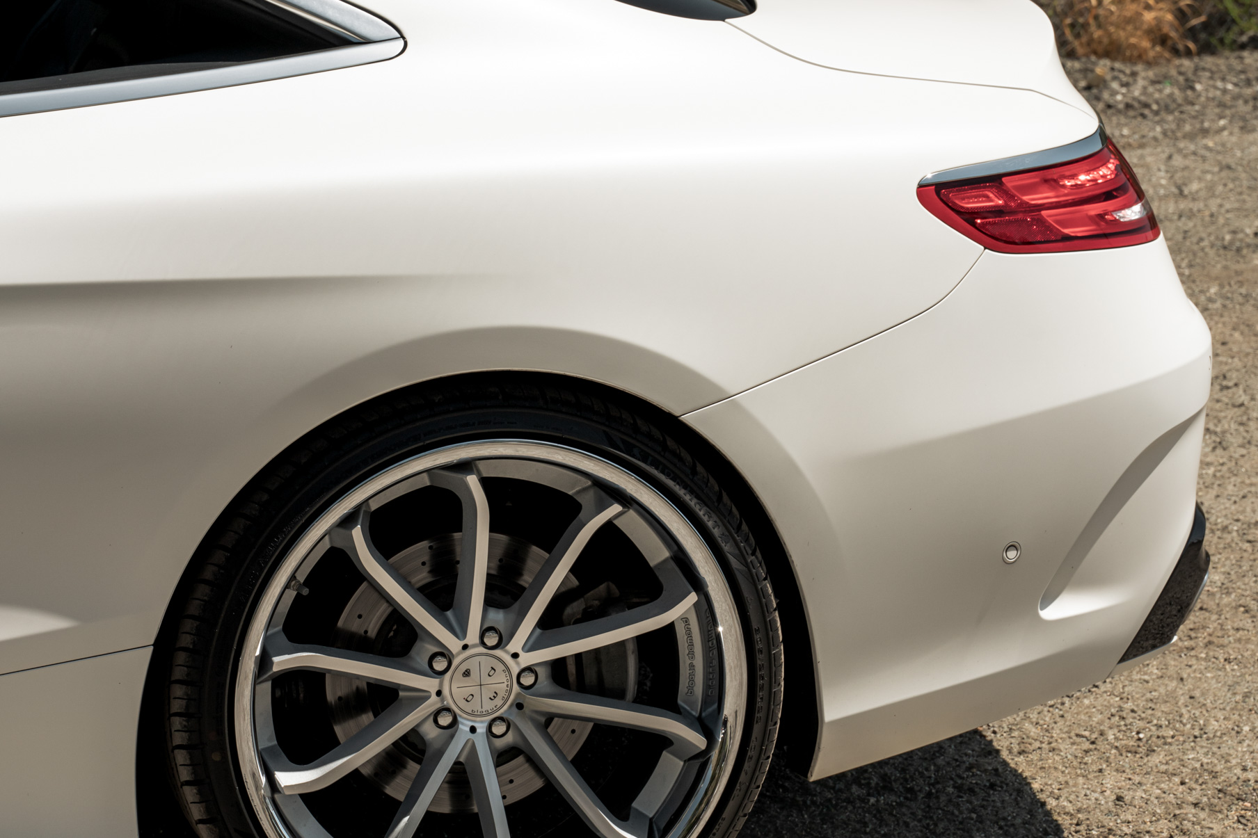 A 2015 Mercedes-Benz S550 on Blaque Diamond BD-F23 Gloss Silver with Chrome Lip Wheels