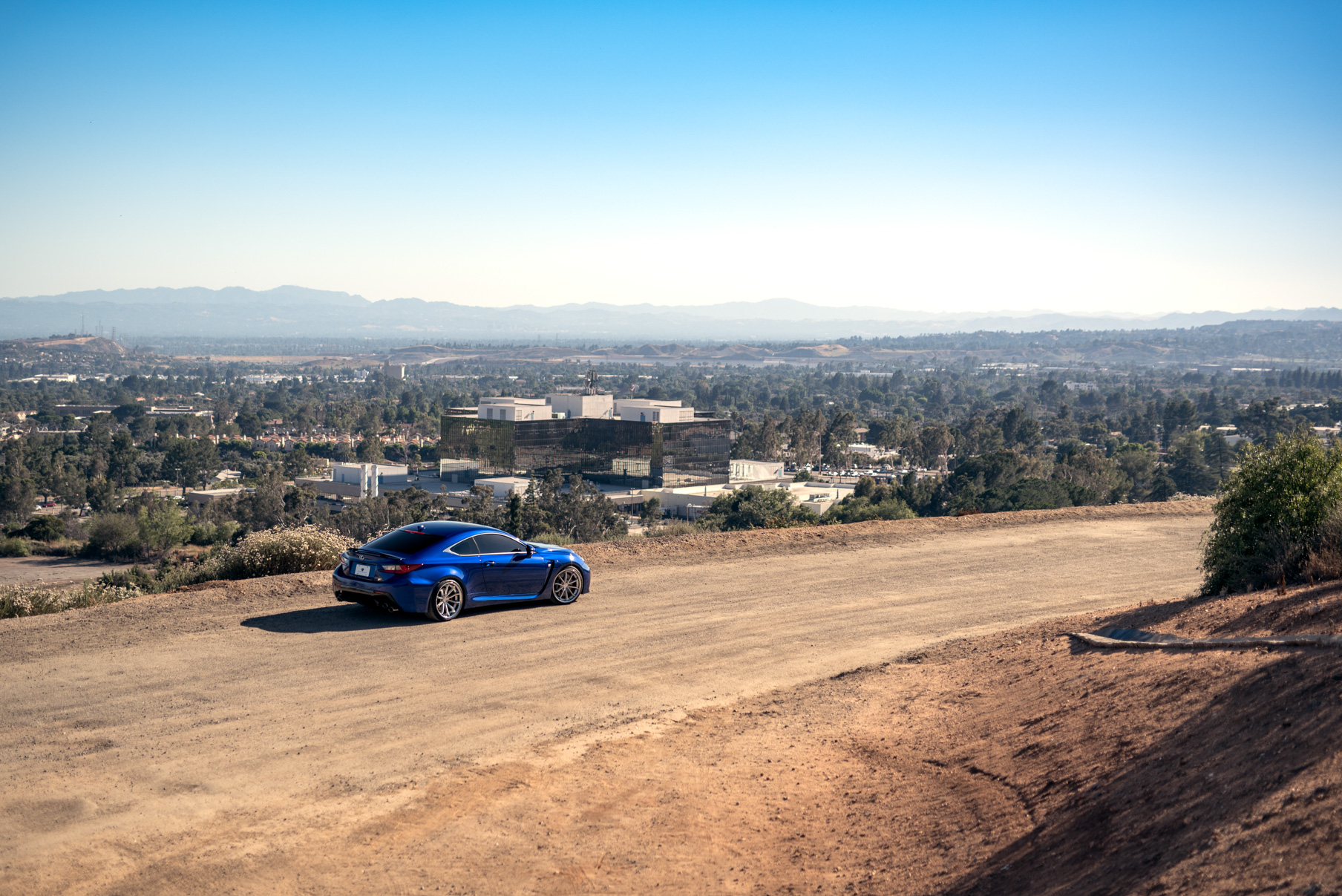 A Blue 2016 Lexus RCF on Blaque Diamond BD-23 Brushed Silver with Chrome Lip Staggered Wheels