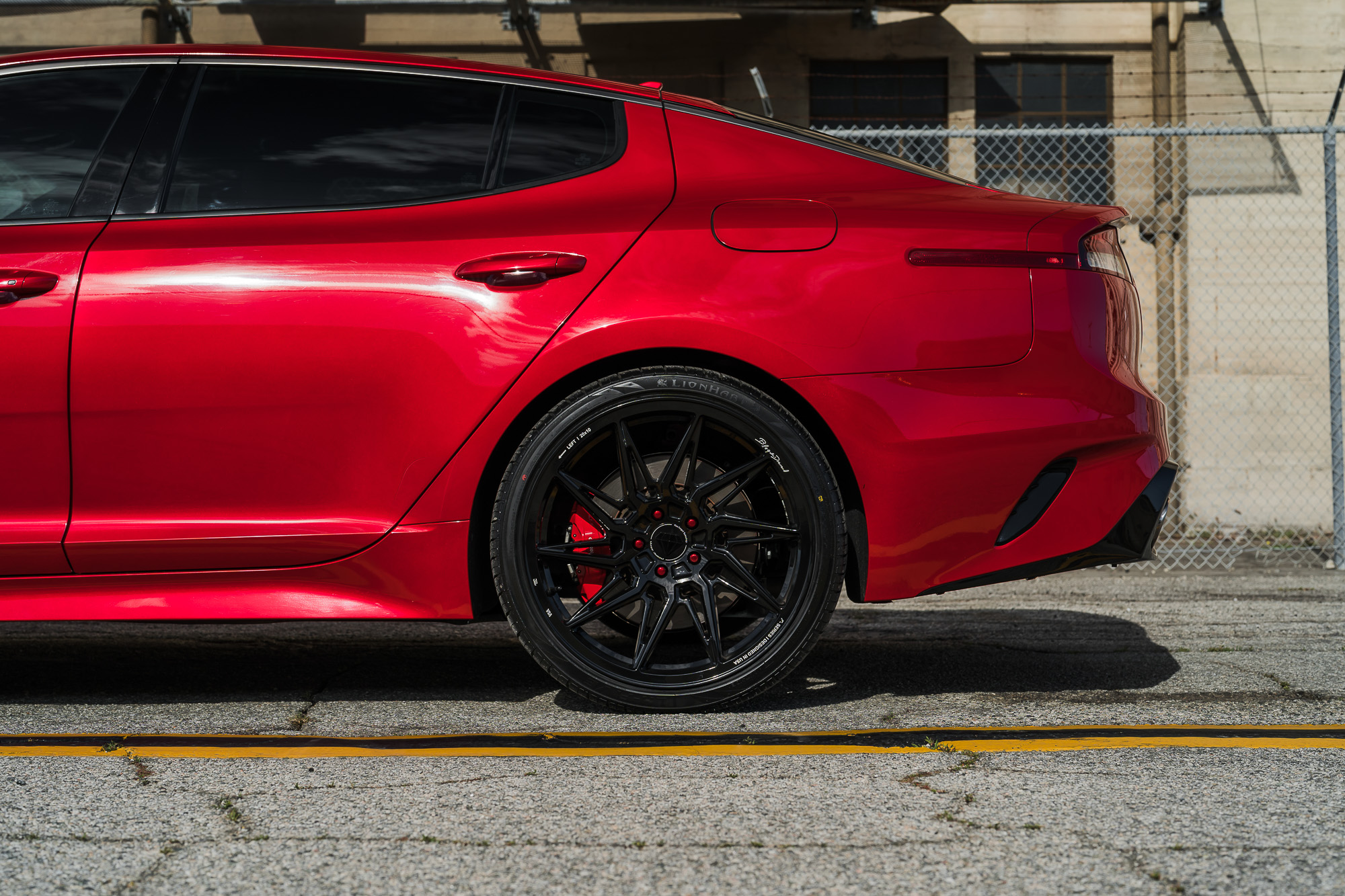 A 2022 Kia Stinger GT on Blaque Diamond BD-F20 Gloss Black Wheels