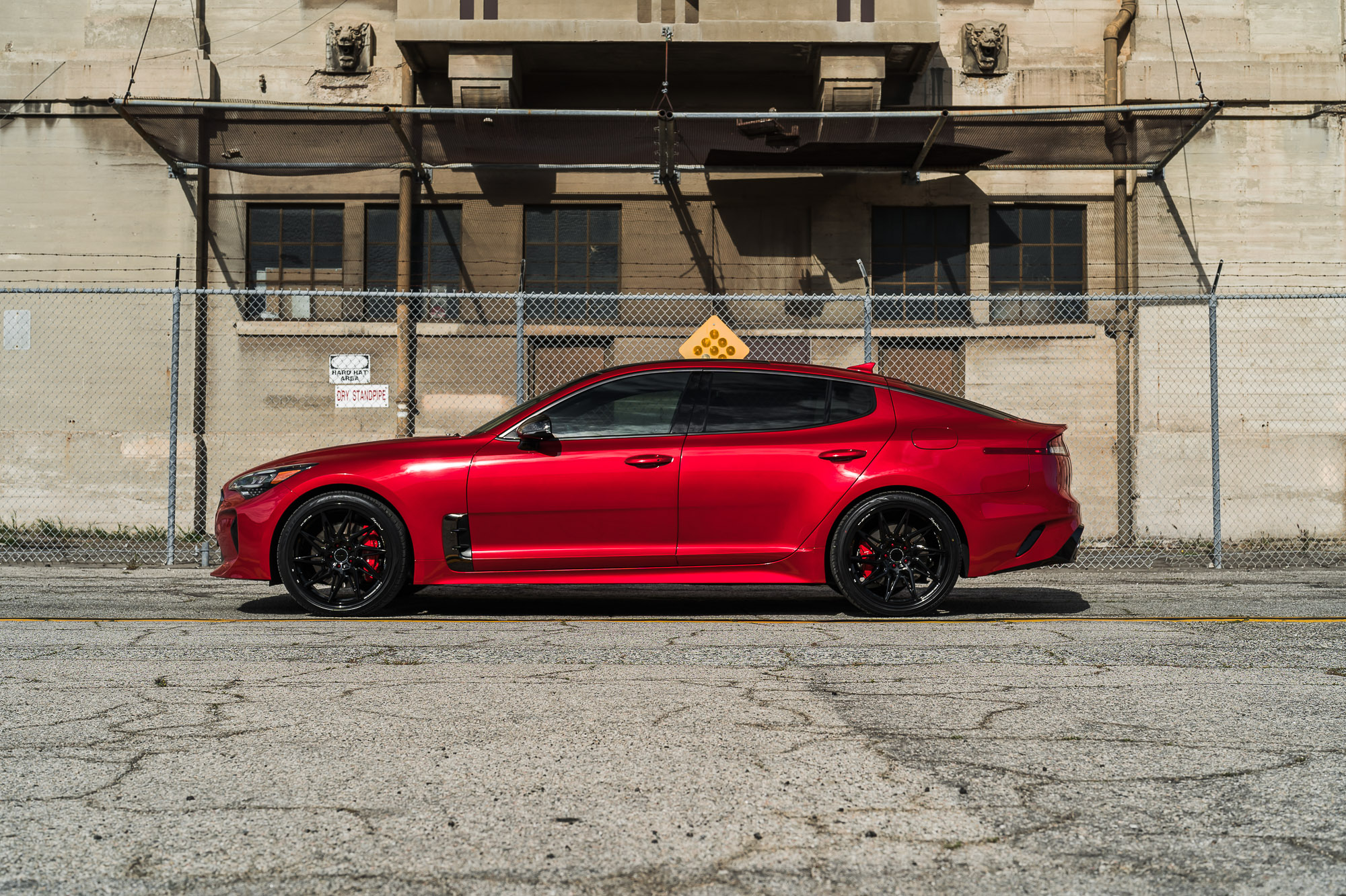 A 2022 Kia Stinger GT on Blaque Diamond BD-F20 Gloss Black Wheels