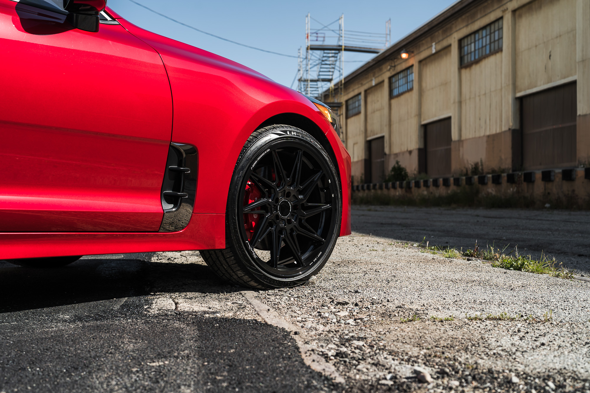 A 2022 Kia Stinger GT on Blaque Diamond BD-F20 Gloss Black Wheels