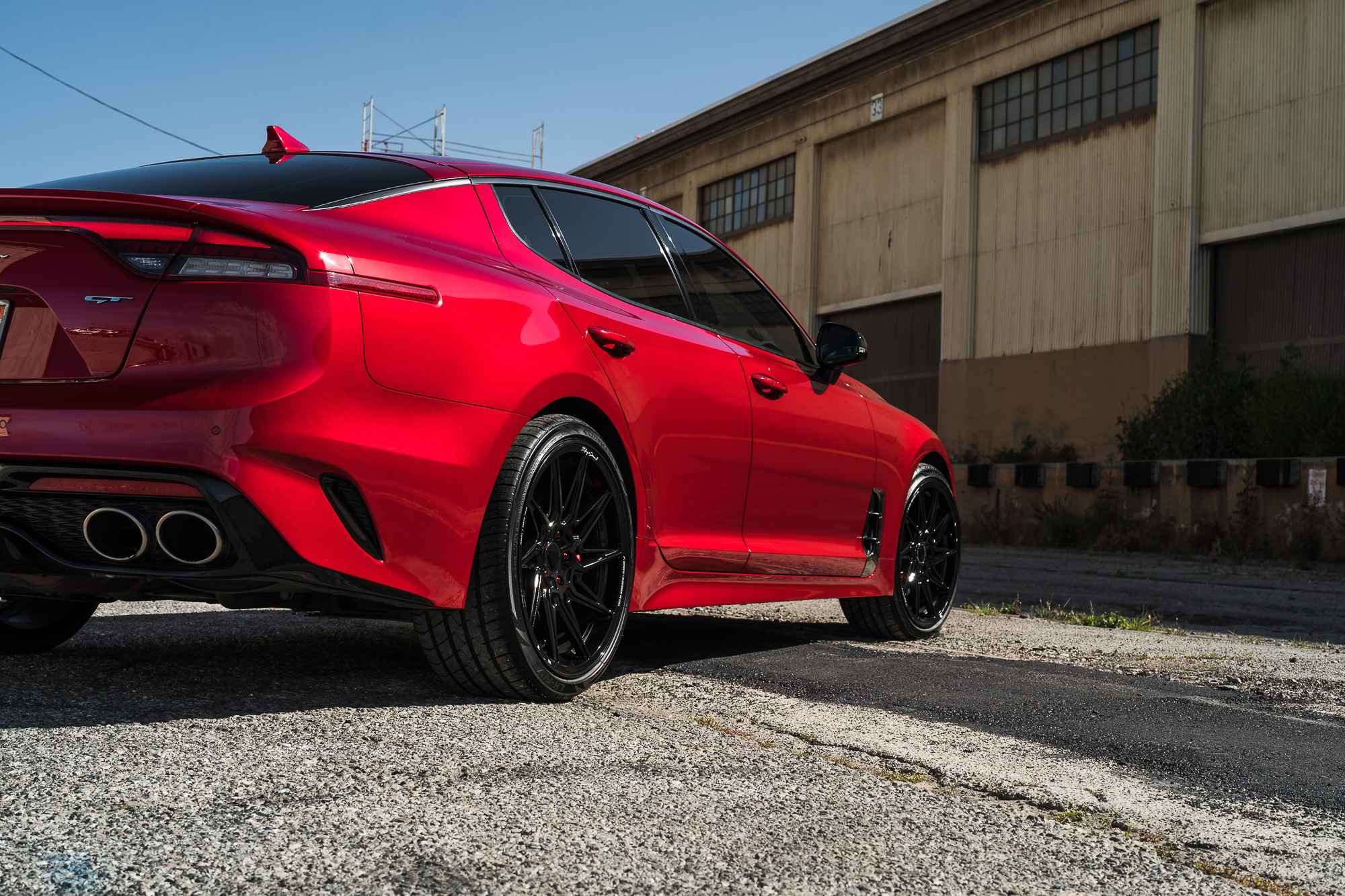 A 2022 Kia Stinger GT on Blaque Diamond BD-F20 Gloss Black Wheels