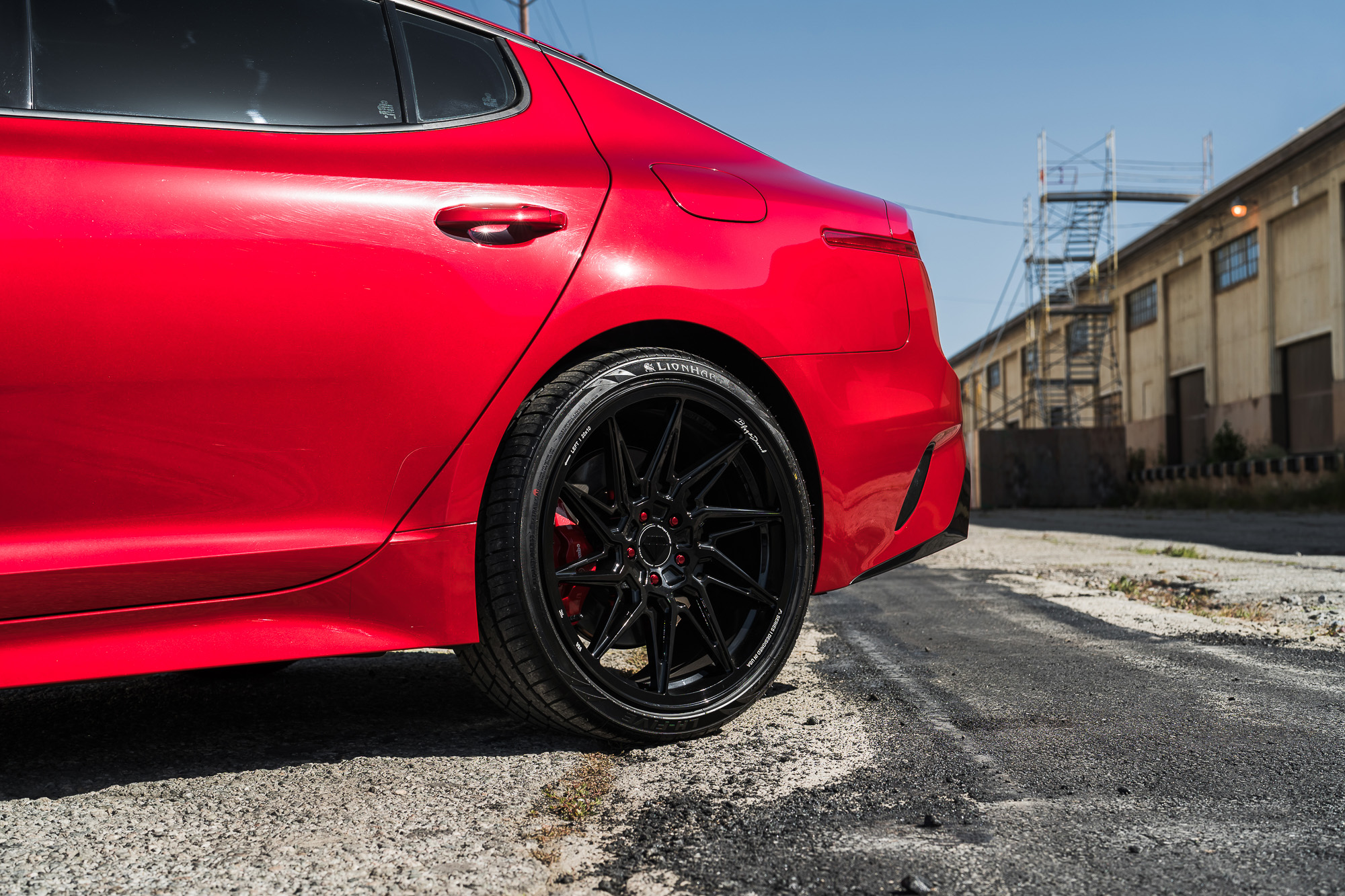 A 2022 Kia Stinger GT on Blaque Diamond BD-F20 Gloss Black Wheels
