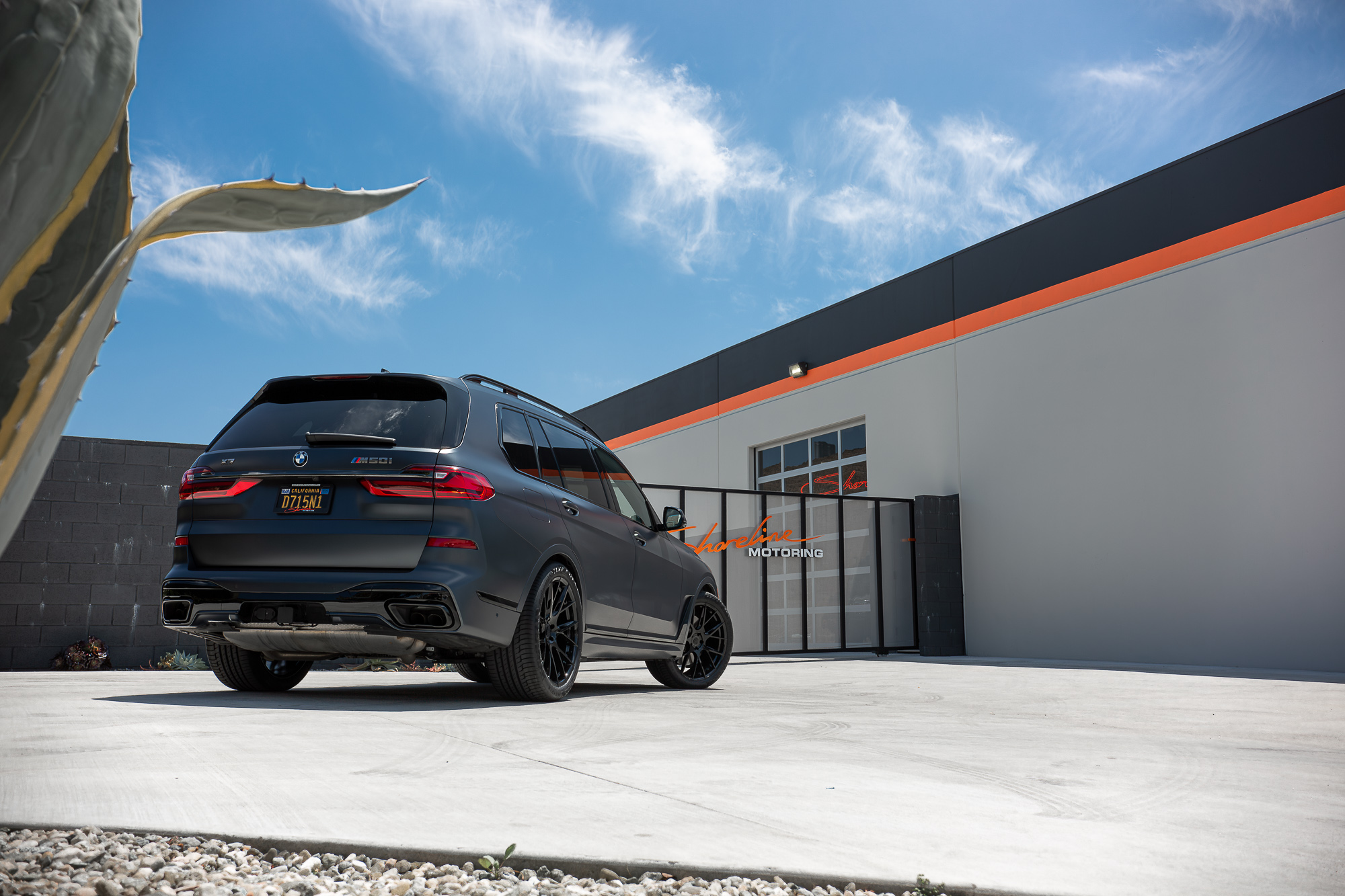 A Matte Black 2022 BMW X7M on Blaque Diamond BD-F18 Gloss Black Wheels