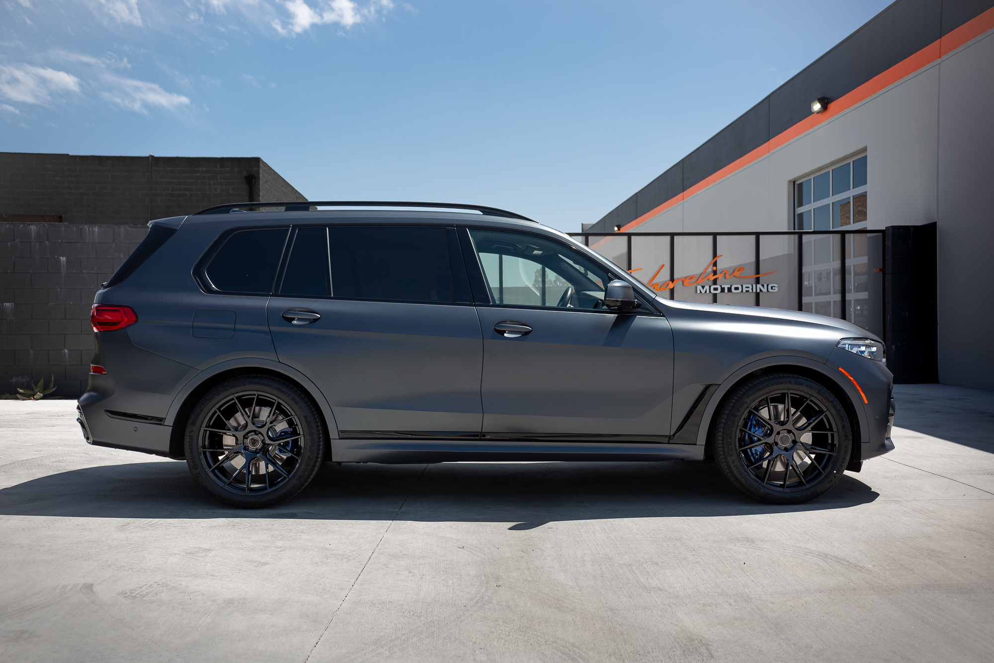 A Matte Black 2022 BMW X7M on Blaque Diamond BD-F18 Gloss Black Wheels