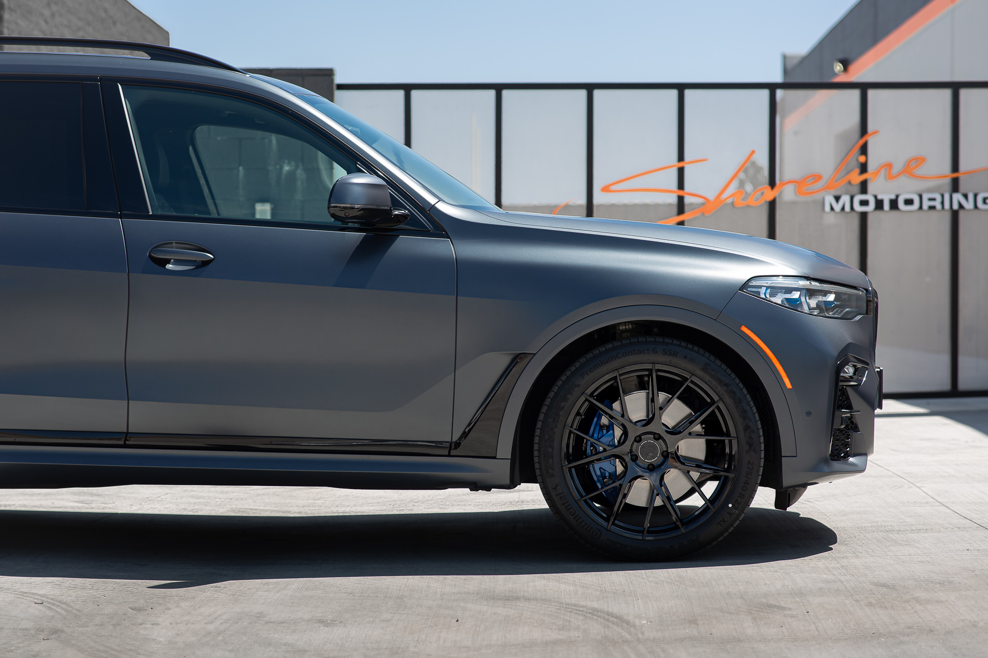 A Matte Black 2022 BMW X7M on Blaque Diamond BD-F18 Gloss Black Wheels