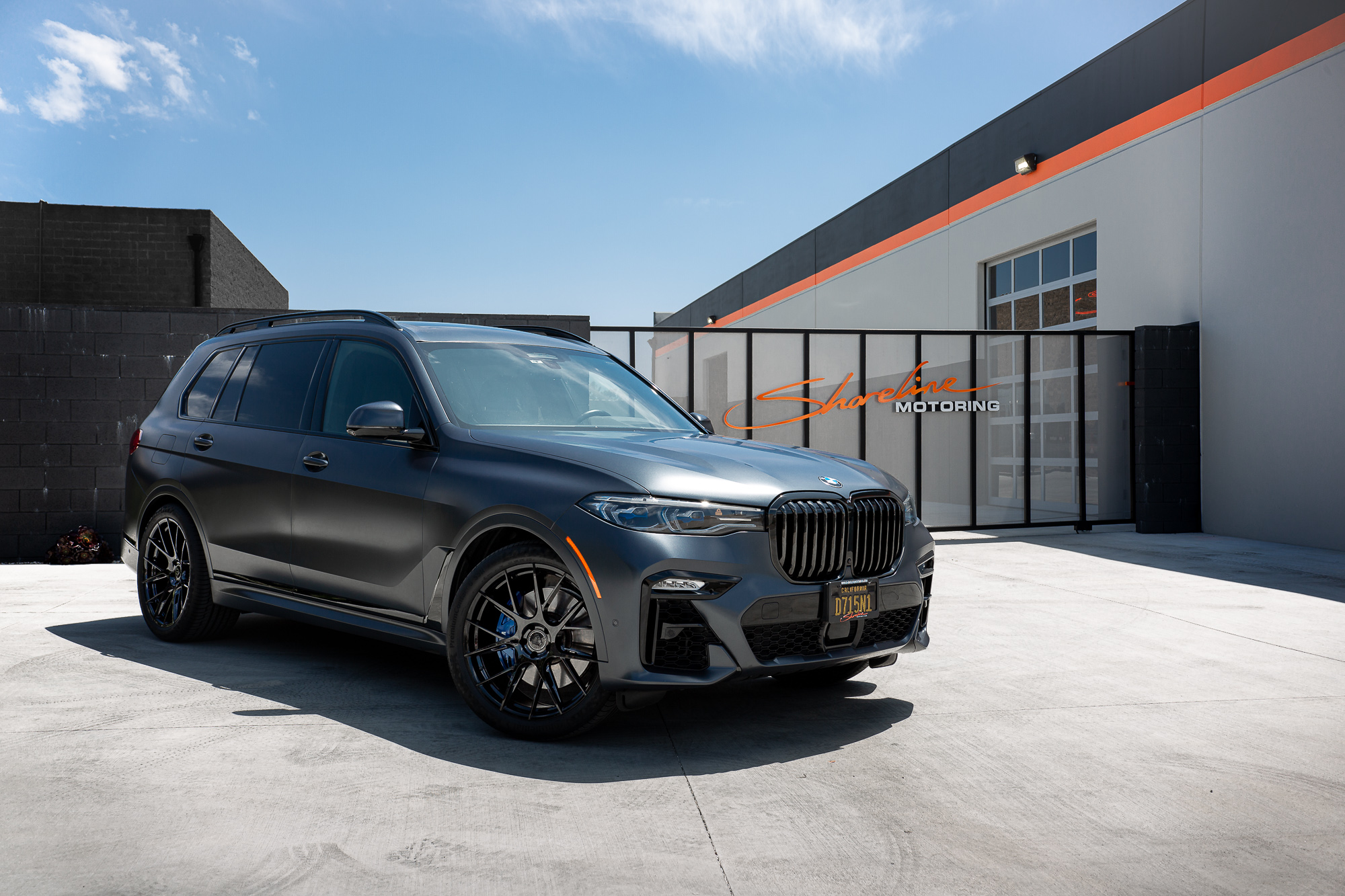 A Matte Black 2022 BMW X7M on Blaque Diamond BD-F18 Gloss Black Wheels