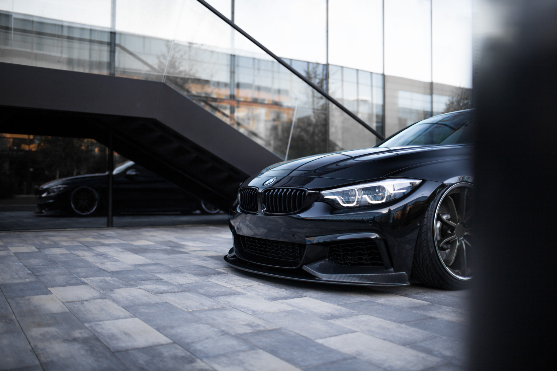 A 2015 BMW 4 Series Coupe on 20 Inch Blaque Diamond BD-23 Bronze Wheels