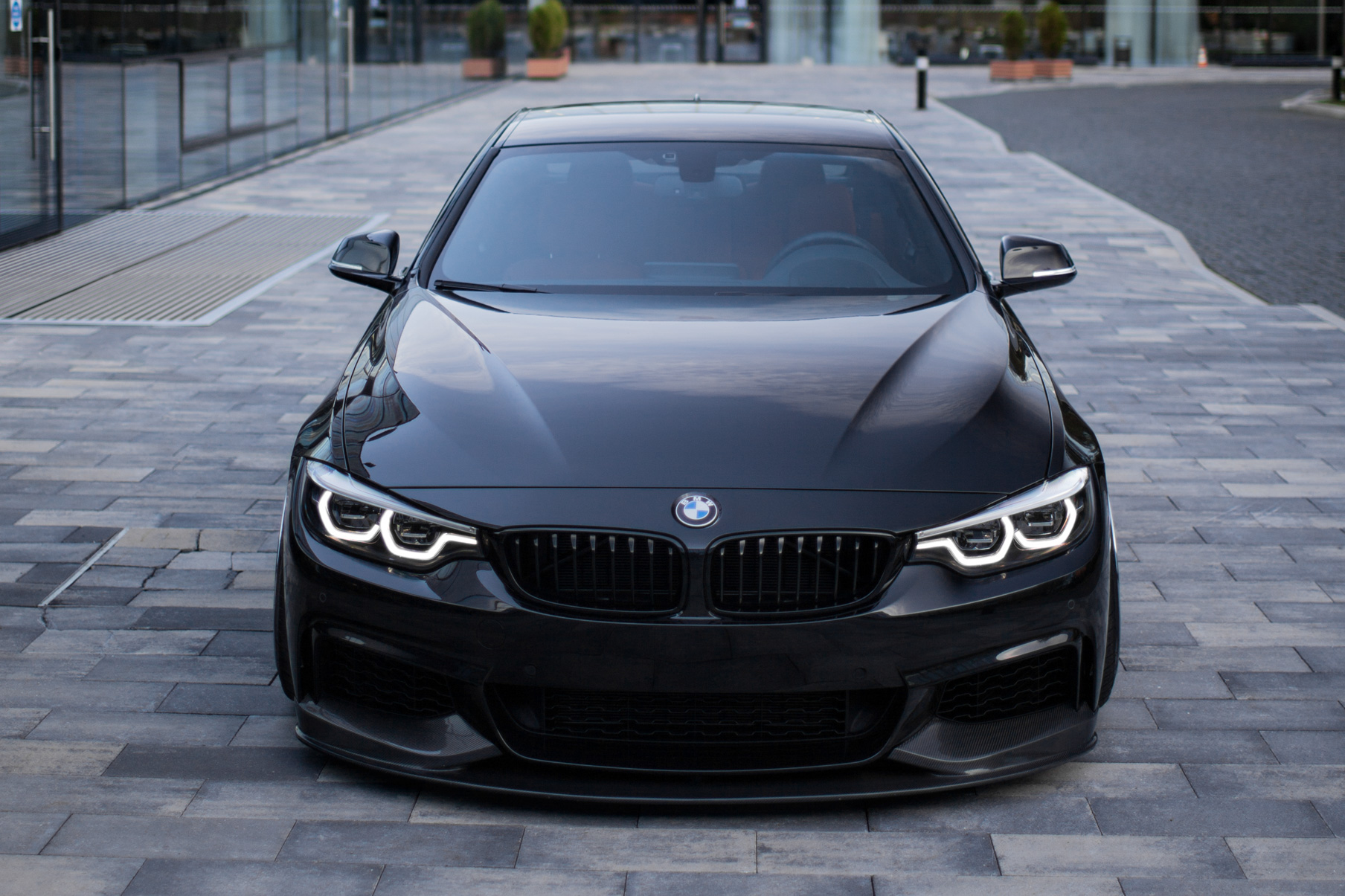 A 2015 BMW 4 Series Coupe on 20 Inch Blaque Diamond BD-23 Bronze Wheels