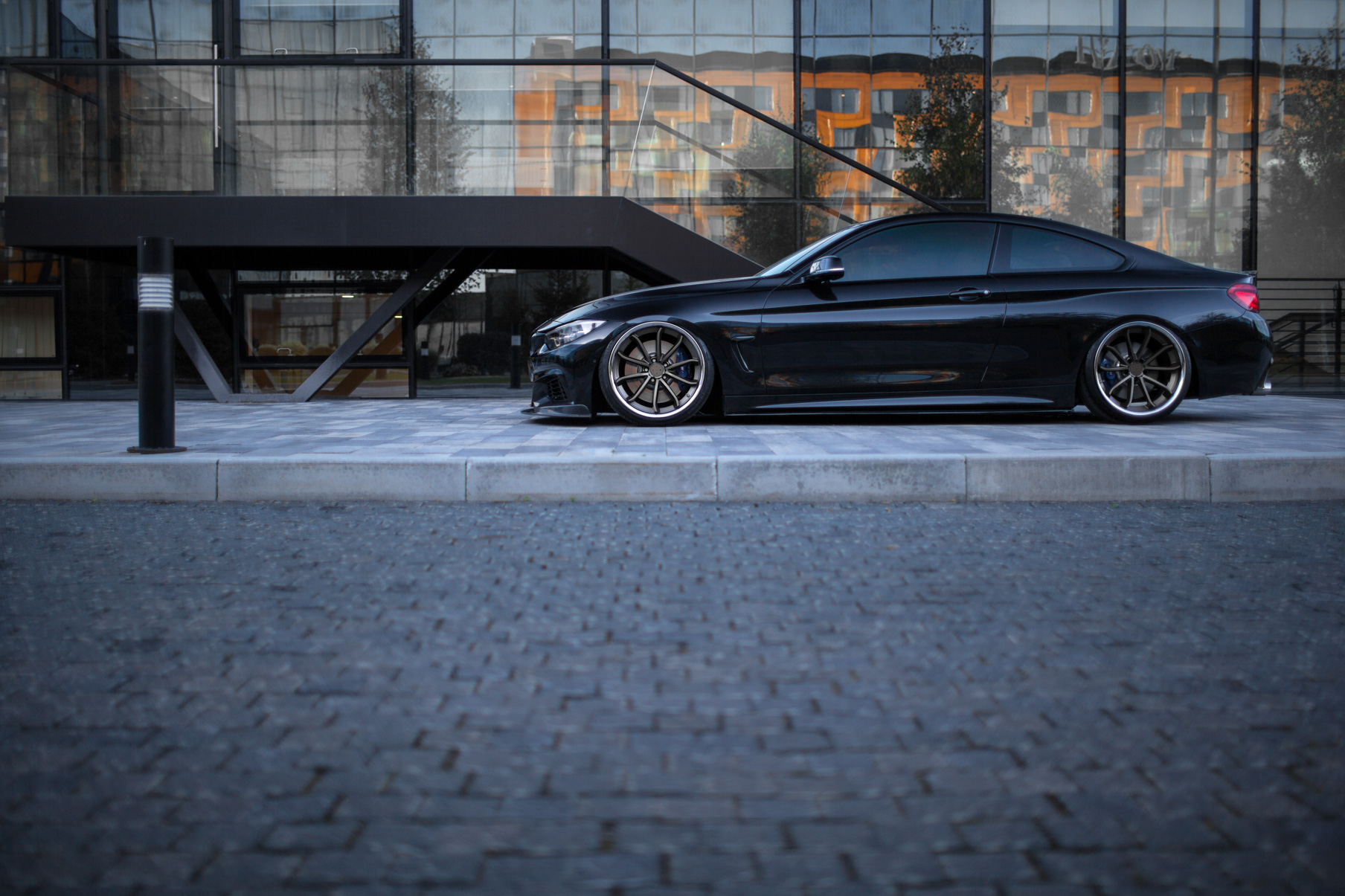 A 2015 BMW 4 Series Coupe on 20 Inch Blaque Diamond BD-23 Bronze Wheels