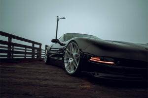 The Chevrolet Corvette stands tall as one of America's most iconic performance vehicles, a quintessential muscle car that has captivated generations of automotive enthusiasts. The C5 Corvette made its debut in 1996, eventually succeeded by the C6 Corvette in 2005. Renowned for its robust 5.7L LS1 engine, delivering 345 horsepower and 350 lb-ft of torque, the C5 was also notable for being the final model to feature the iconic popup headlights. This 2001 Chevrolet Corvette has undergone significant modifications, including an air suspension system from Airlift, custom carbon fiber widebody fenders, various engine enhancements, and our highly sought-after Brushed Silver F12 wheels from our Flow forged series. The outcome? A striking combination that commands attention, whether cruising along the highway or parked with an impressive stance. These F12 wheels represent the ultimate aftermarket upgrade for your C5 or C6 Corvette, ensuring a standout presence wherever you go!